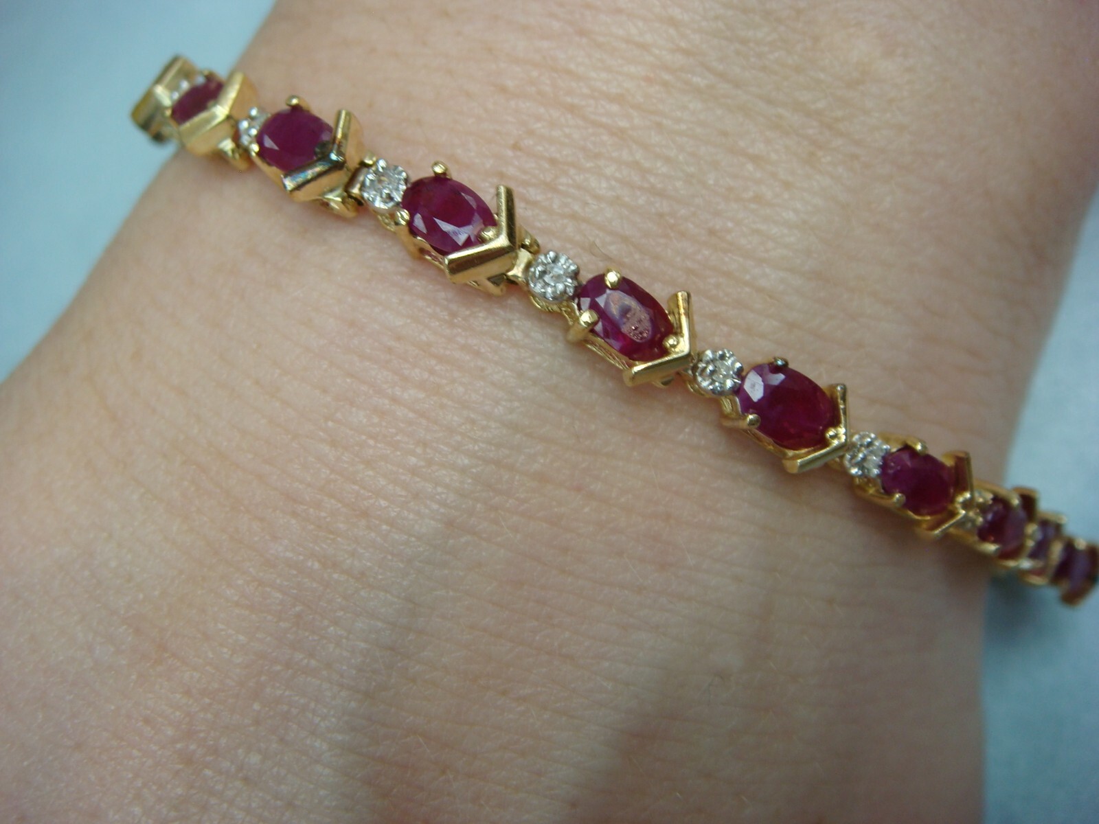 14 KT YELLOW GOLD GENUINE RUBY AND DIAMONDS TENNIS BRACELET 8.8 GRAMS 6.5 “