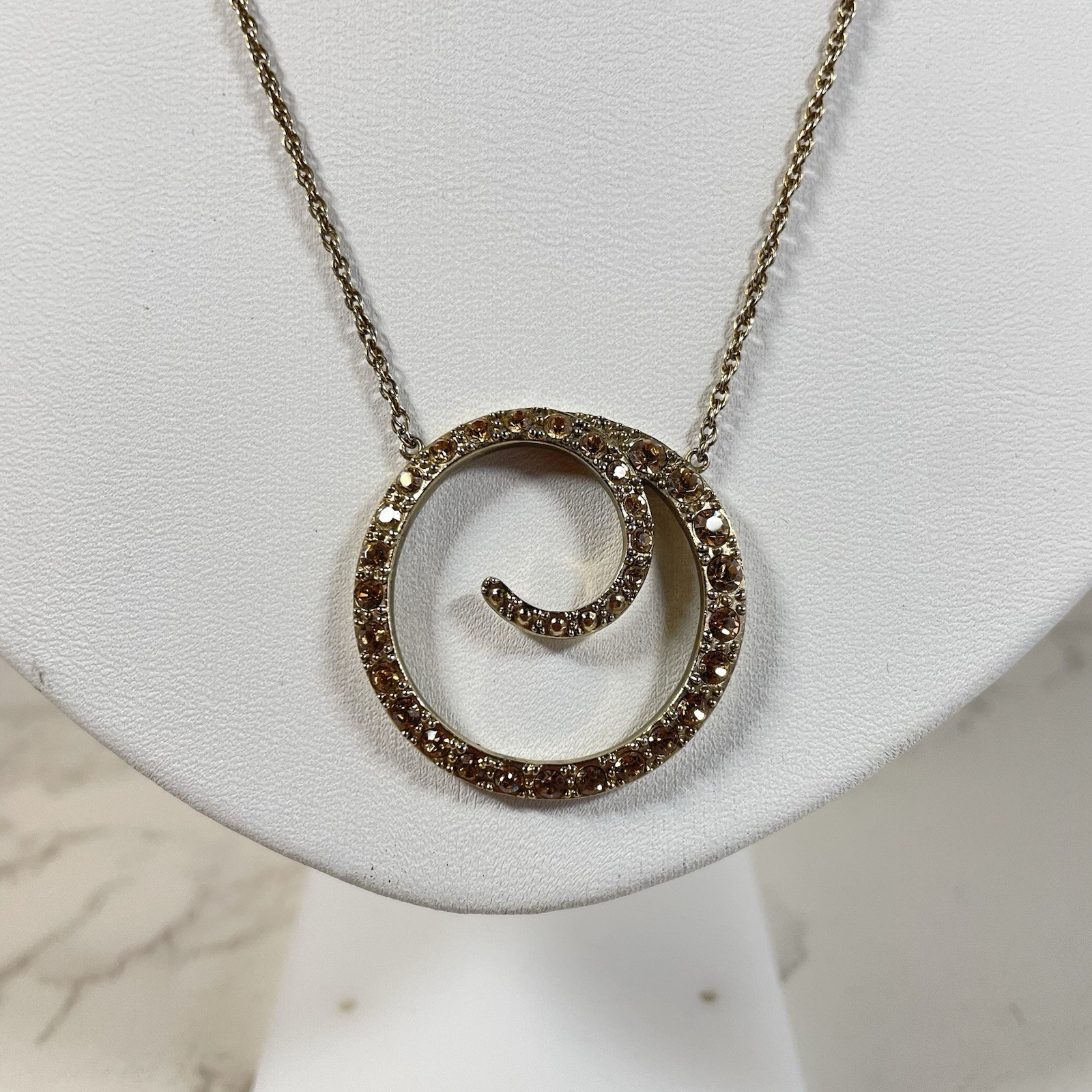 Vintage Monet Gold Tone Topaz Rhinestone Swirl Circle Pendant Necklace Chain 16″