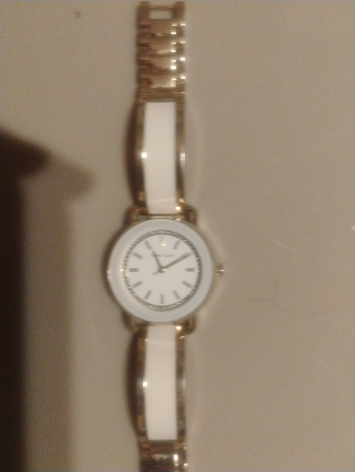 Anne Klein Women’s Glitter Accented Bangle Watch, AK/3690, Gold/White Details