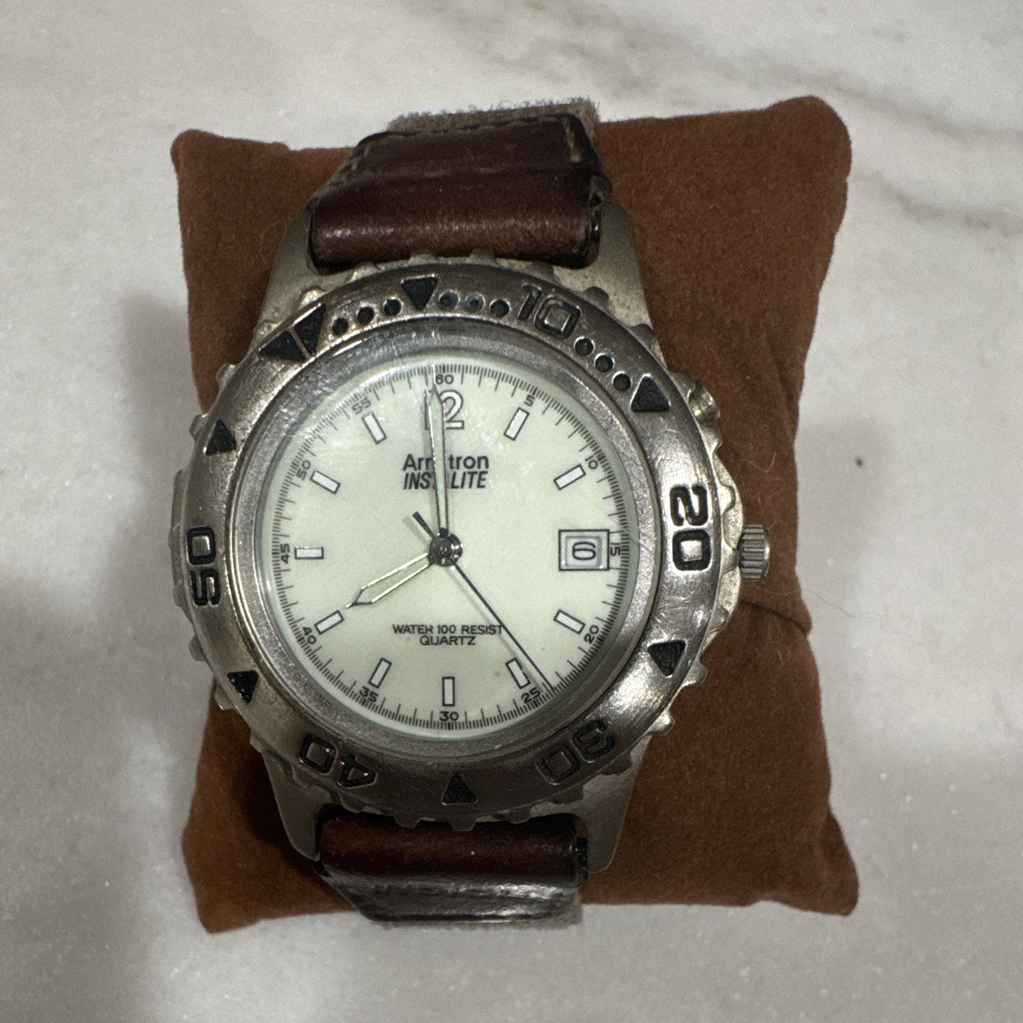 Armitron Instalite Quartz Analog Watch White Dial Arabic Date Brown Leather 100m