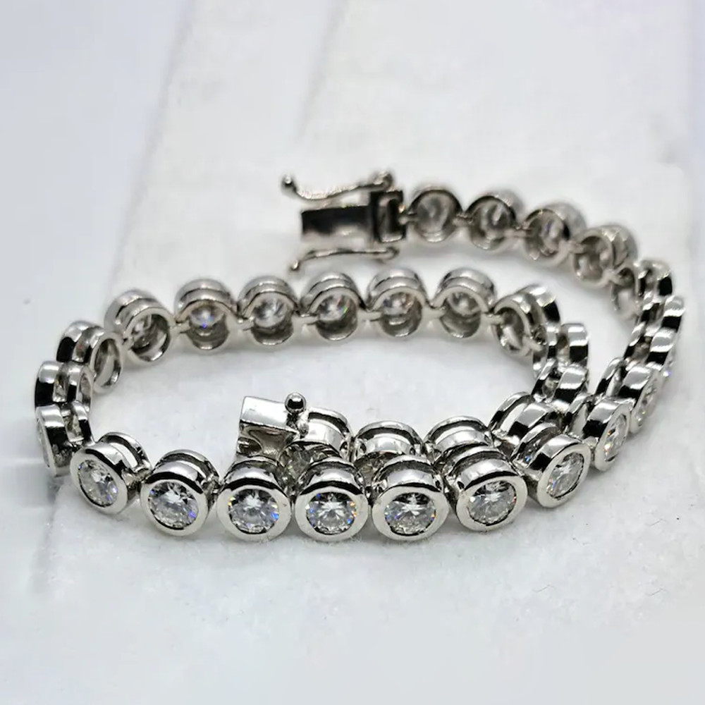 4 mm Round Cut Moissanite Bezel Set Tennis Bracelet In 14K White Gold Plated