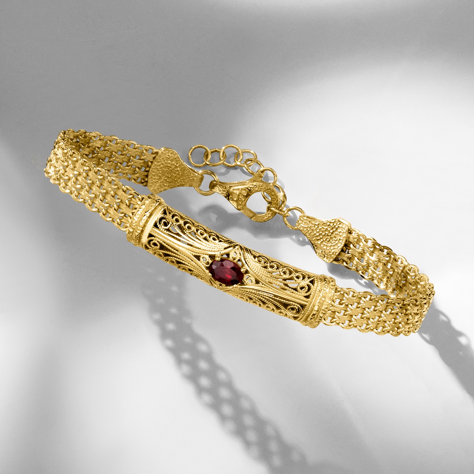0.70 Carat Garnet Filigree Bracelet in 18kt Gold Over Sterling. 7 inches