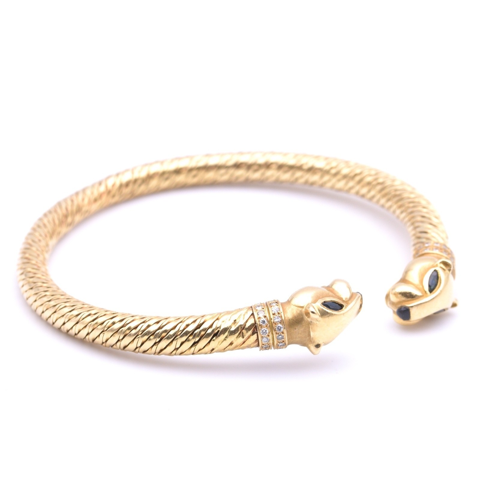 Cartier Vintage Double Head Panther Bracelet in 18Kt. GG with Safirs and Onyx