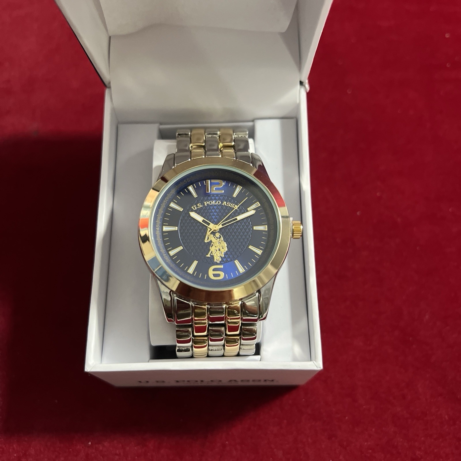 U.S. Polo Assn. Men’s Analog Bracelet Watch Blue Dial with Gold-Tone Bezel