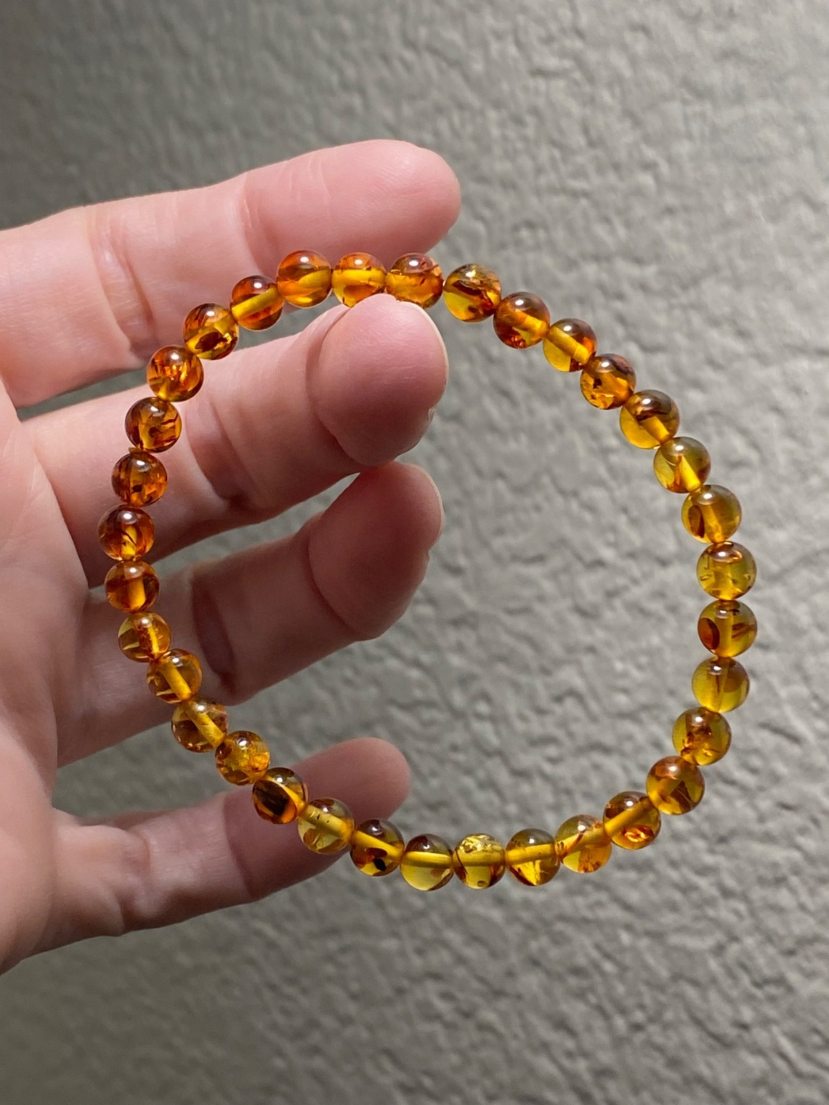 Flower Amber Stretch Bracelet – Approx. 5.8mm Beads – Fits Approximately 7 Inch