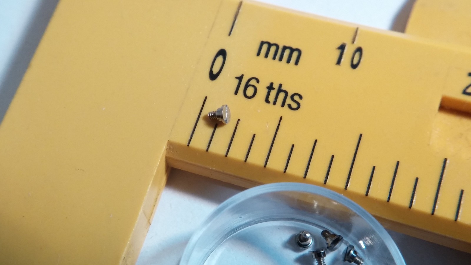 Jaeger Lecoultre cal 497 SCREW flat head watch part 1.5mm head diameter, 1.5mm l