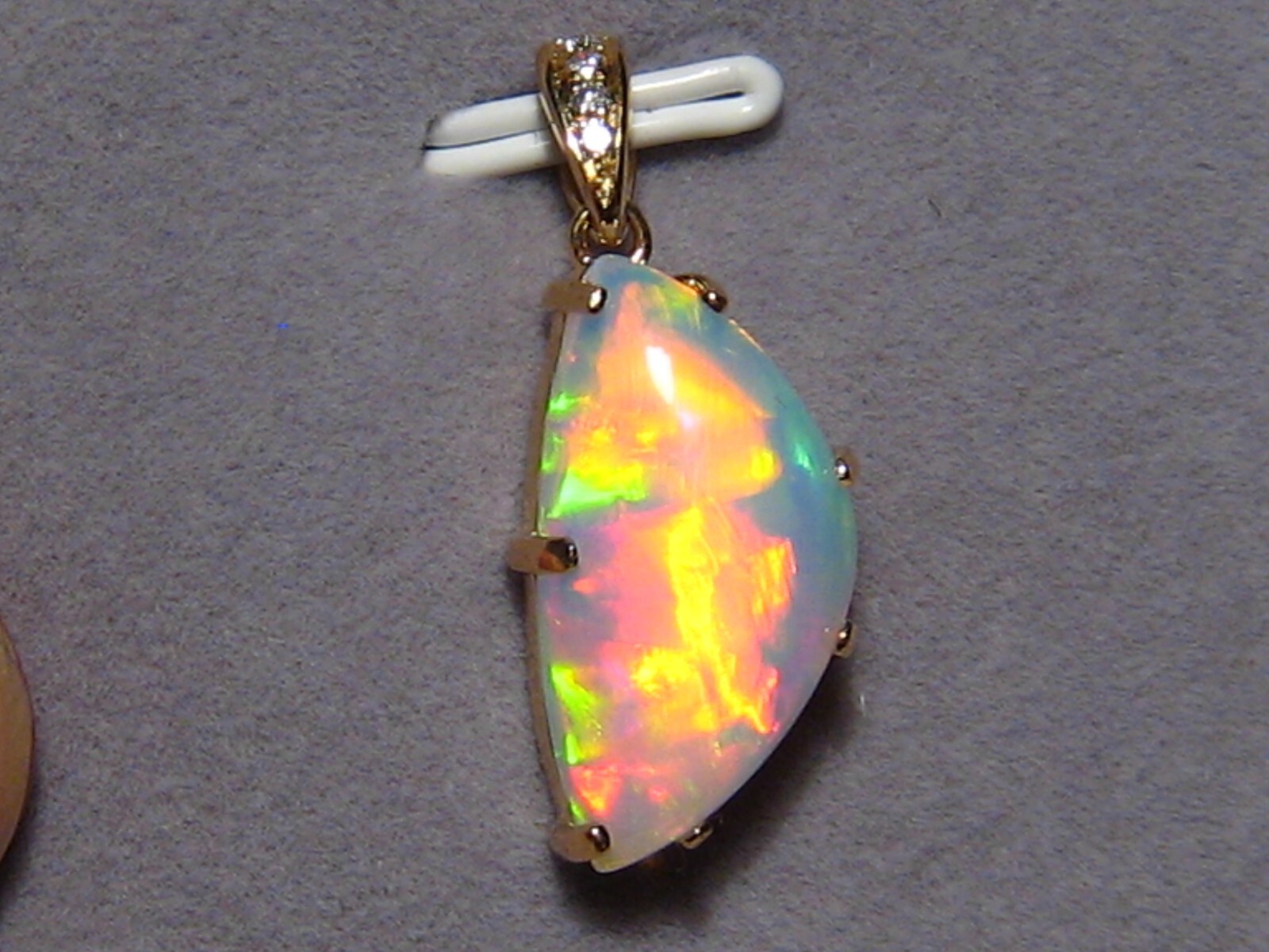 5.1 ct. Ethiopian Gem Opal and Diamond Pendant , 18 k Yellow Gold