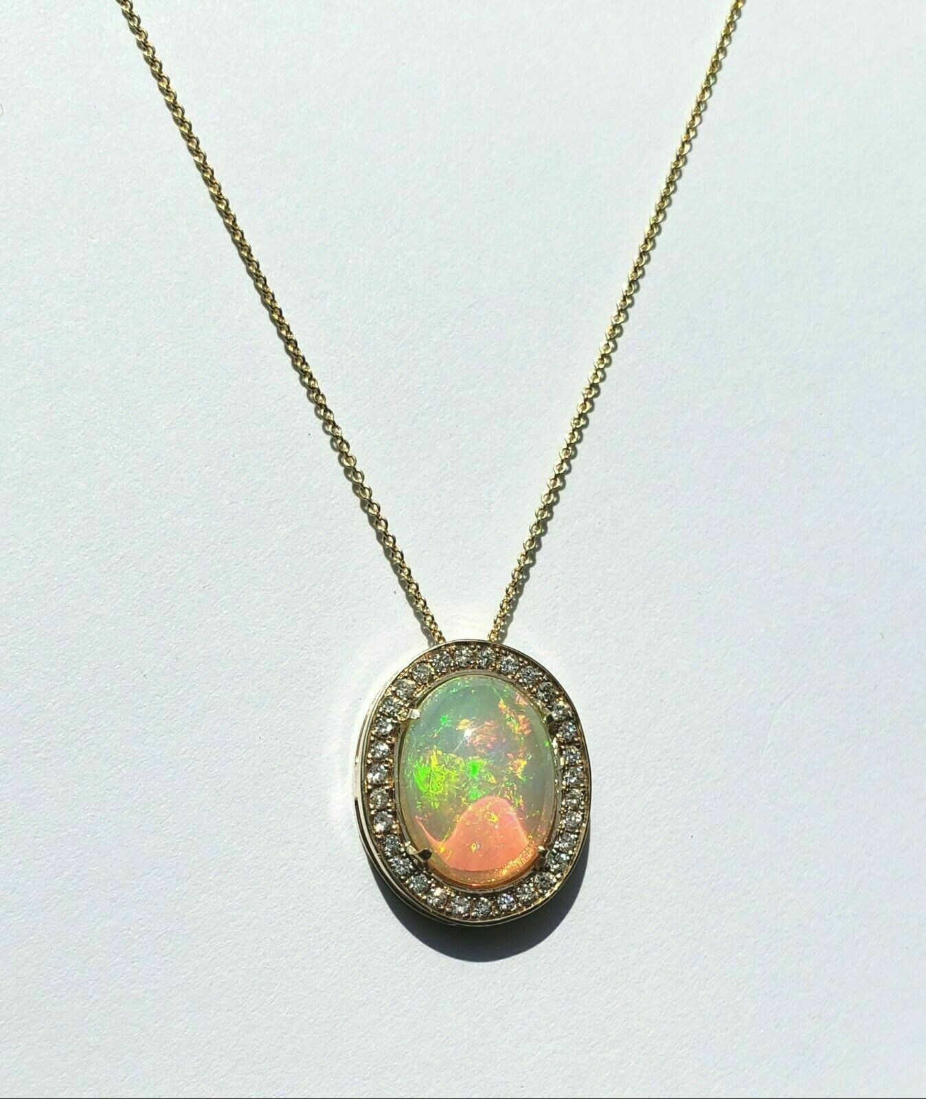 Delicate 3.20Ct Oval Cut Fire Opal Halo Pendant Necklace 14K Yellow Gold Finish.