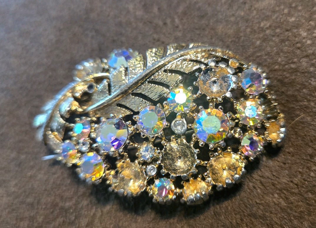 Vintage gold-tone statement brooch from the mid-20th century, costume jewelry