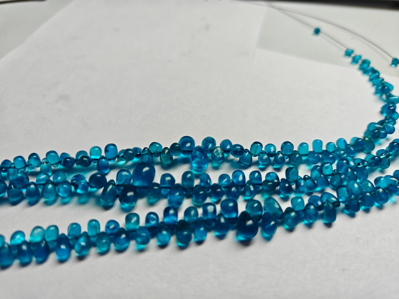 AAA Neon Blue Apatite Teardrop Beads: Smooth Gemstone Strand (6 Inches)