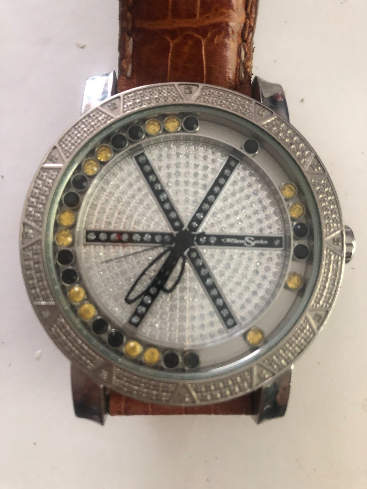 techno swiss watchreal diamond on bazel.