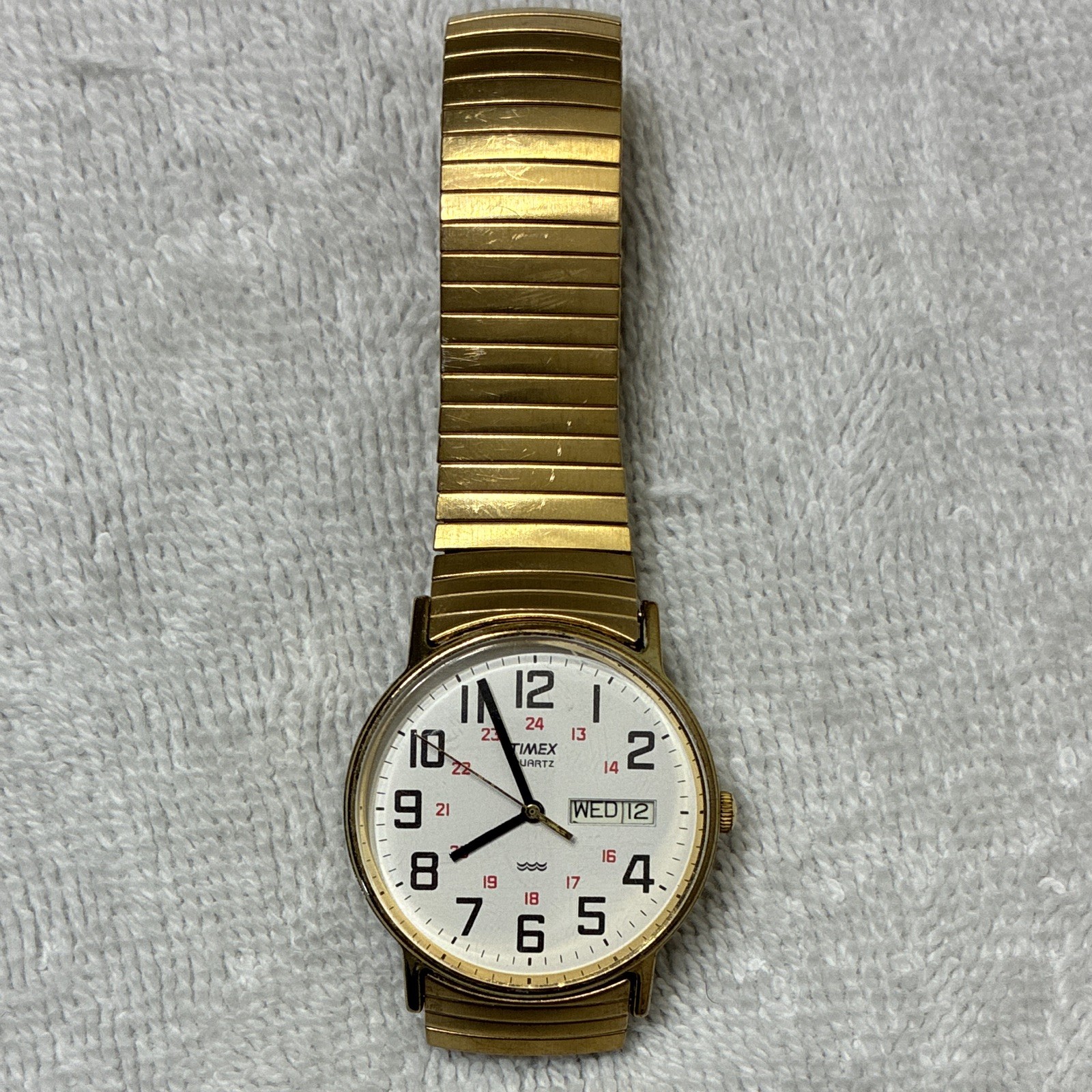 Timex Quartz Men’s Day/Date 34mm White Dial Gold-Tone Metal Bracelet Watch