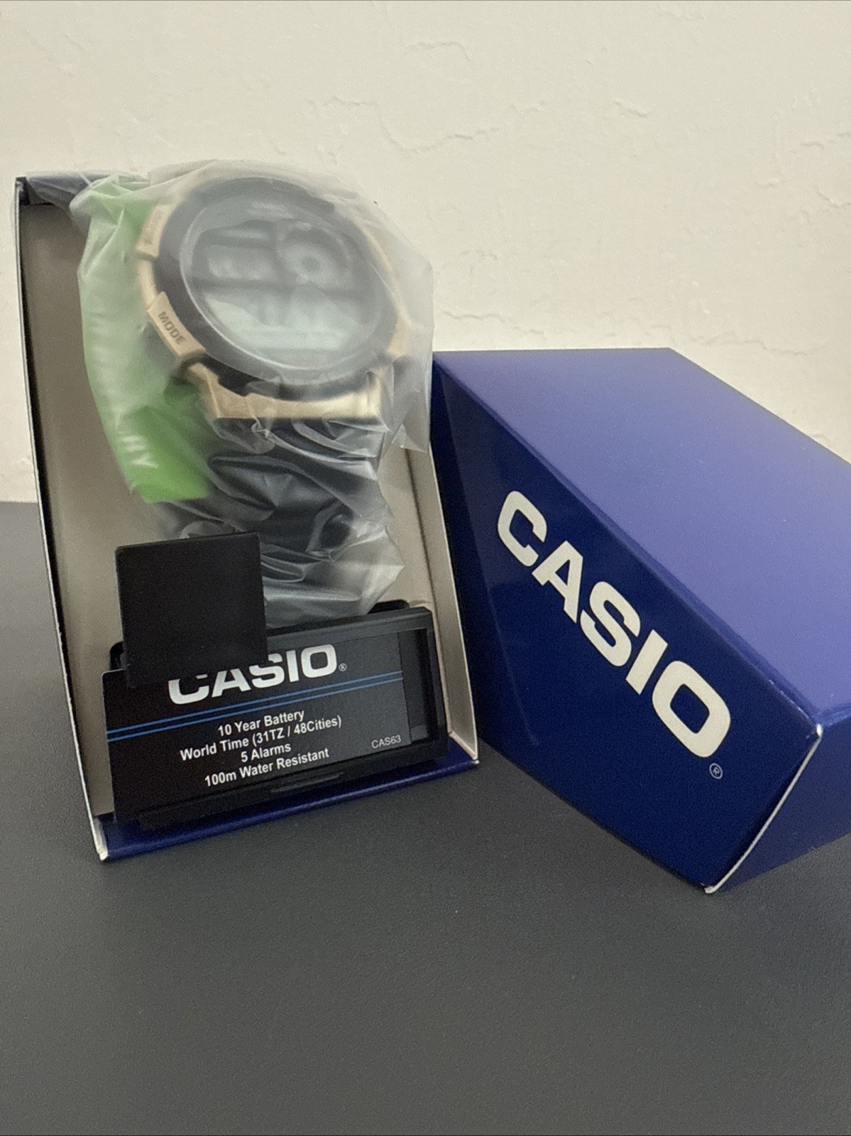 Casio AE1000W-1A3V Men’s Digital World Time Sport Watch Black Gold New