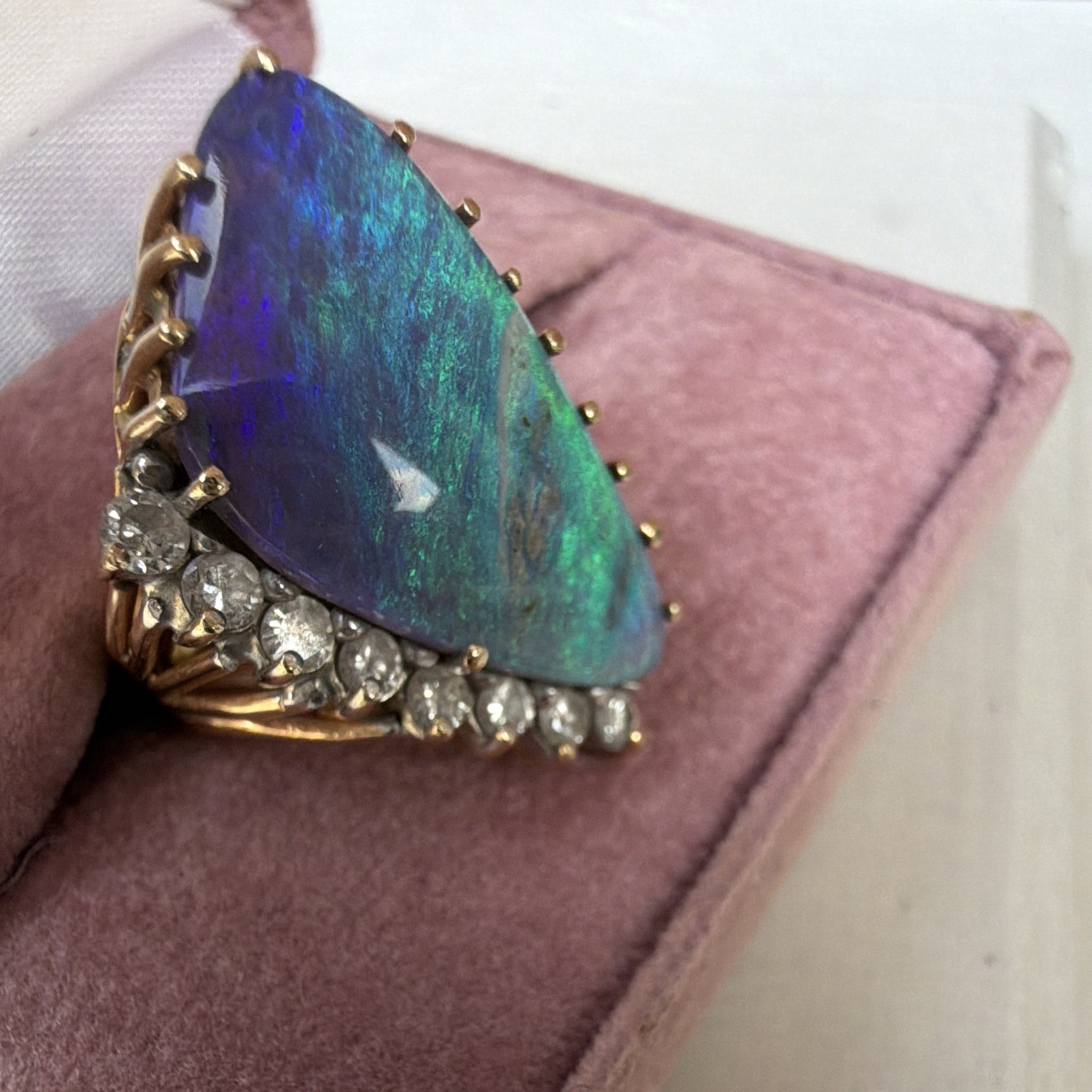 Striking Statement Ring featuring Australian boulder opal accented by diamonds