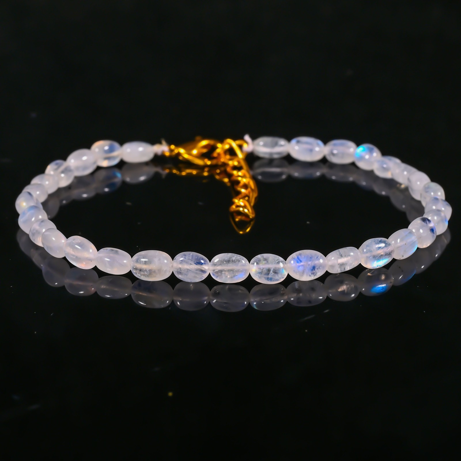 27 Ct. Natural Rainbow Moonstone Briolette Bracelet, Oval Gemstone 6X5X3-6X4X4MM