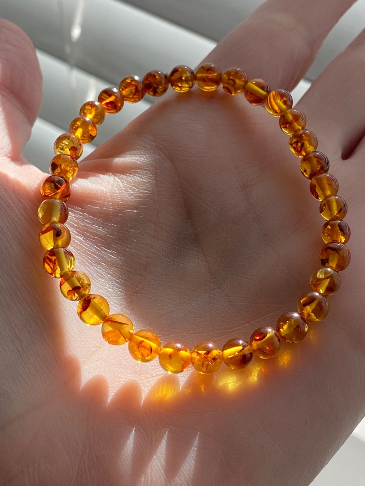 Flower Amber Stretch Bracelet – Approx. 5.8mm Beads – Fits Approximately 7 Inch