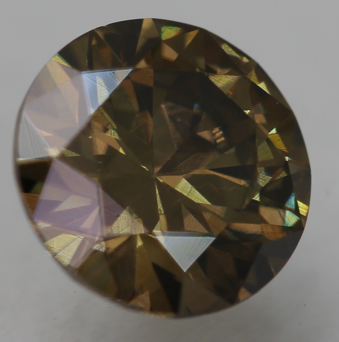 Cert 0.59 Carat Yellow Brown VVS1 Round Brilliant Natural Enhanced Diamond 5.51m