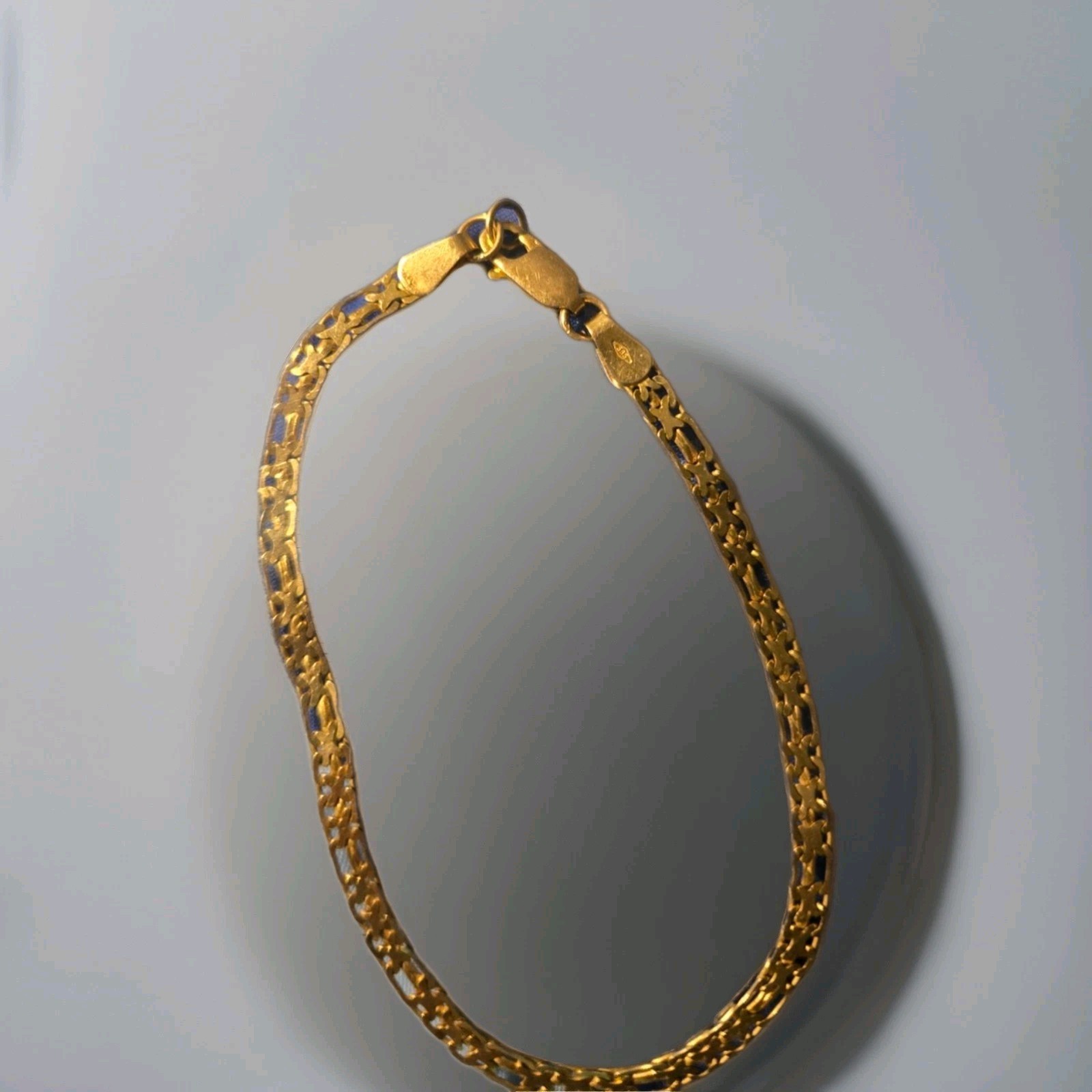 a vintage 14k Italian yellow gold figaro link bracelet 585