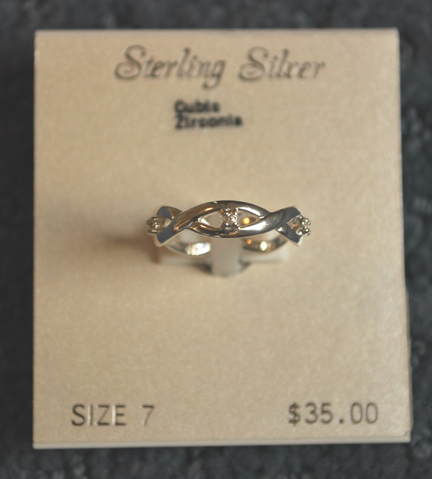 NWT – Sterling Silver Cubic Zirconia ring (size 7) weave design – MSRP $35
