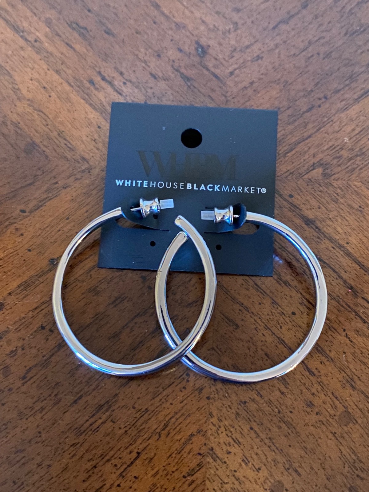 White House Black Market (WHBM) silver hoop earrings – NEW WITH TAGS (NWT)