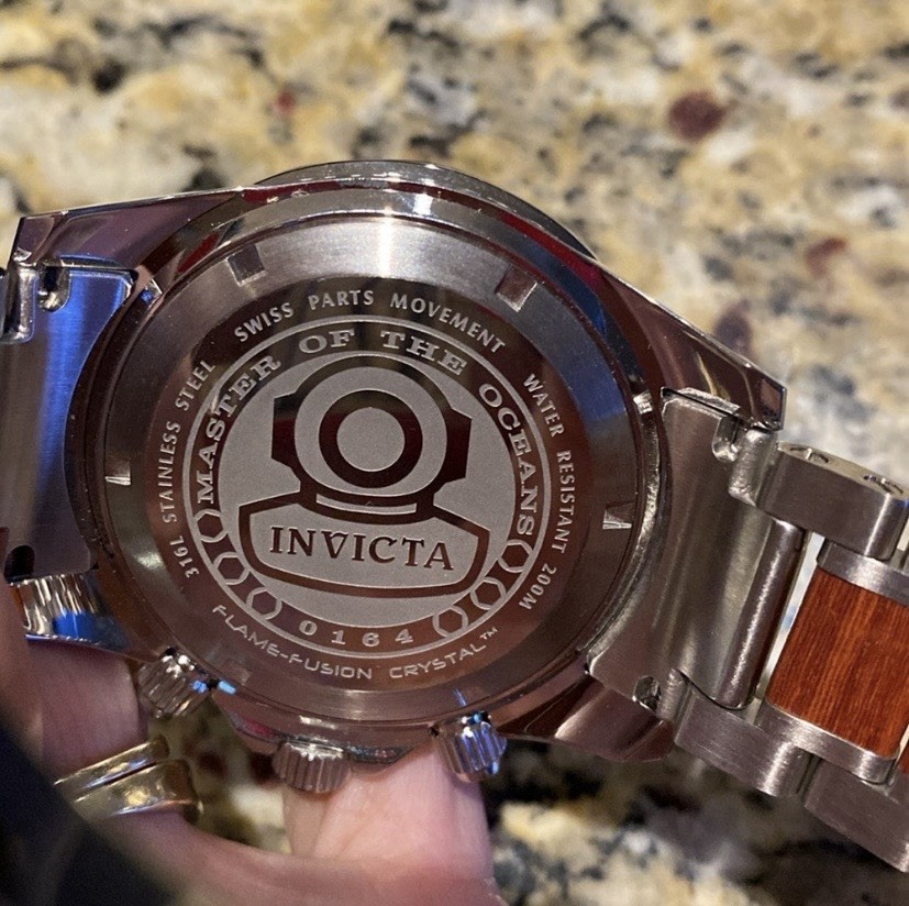 Invicta Pro Diver men’s quartz watch with a wood grain dial model 0164.