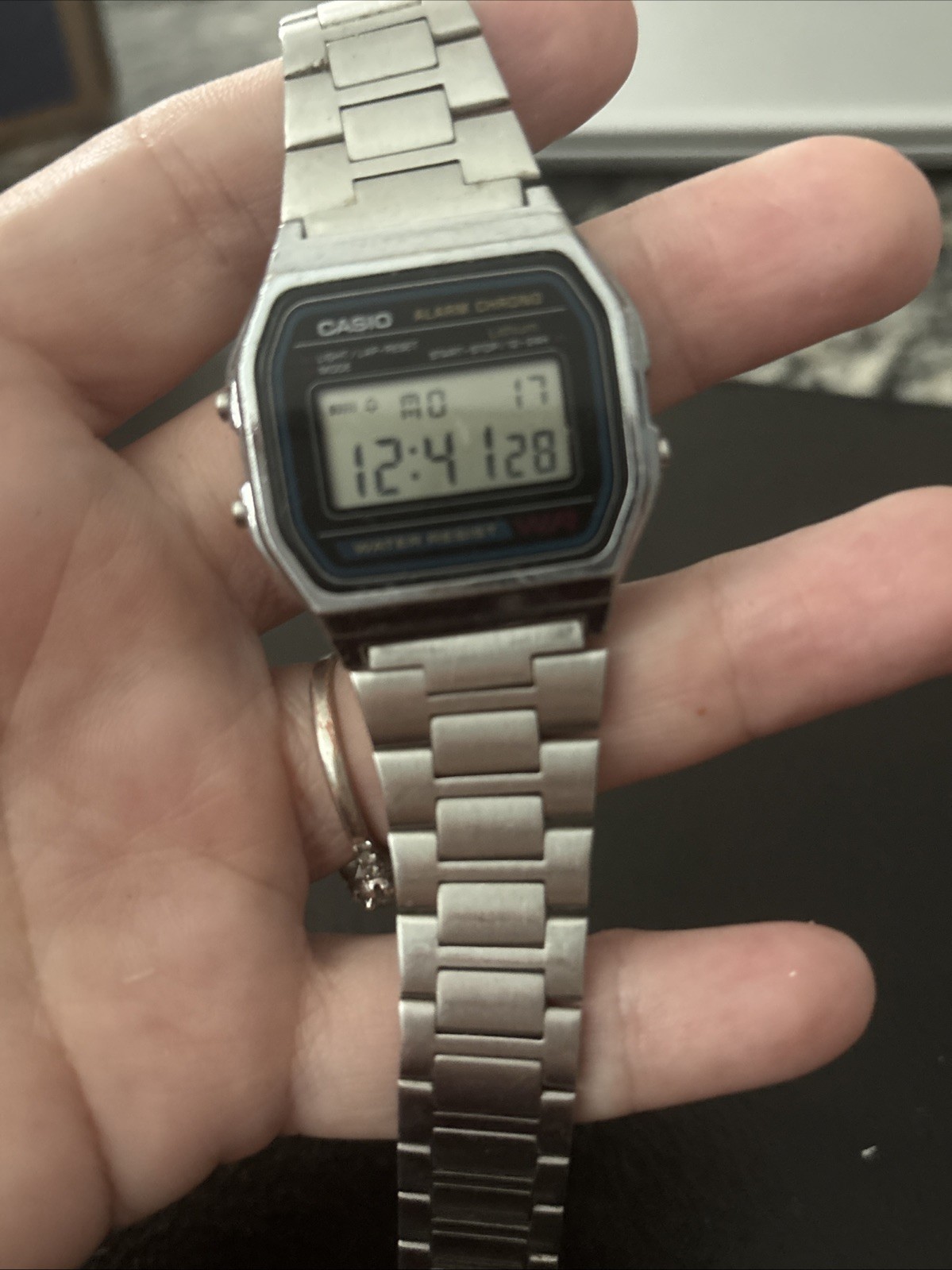 Vintage Casio A158WA-1 digital watch features a classic square face