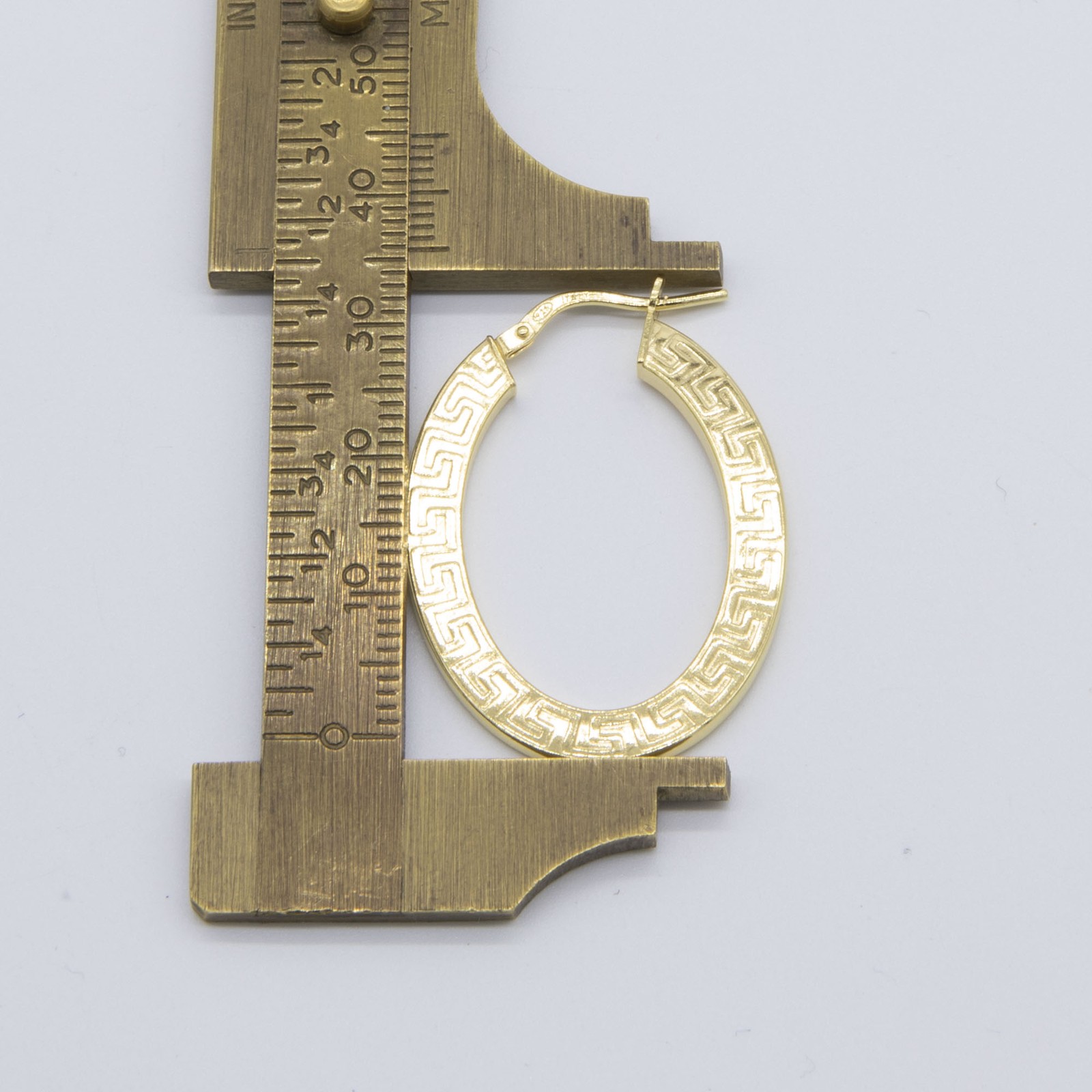 1 3/8″ Oval Greek Key Hoop Earrings 14K Yellow Gold-Plated Silver 925