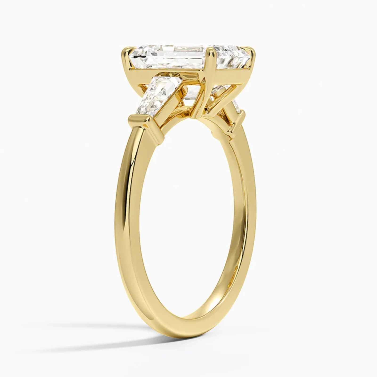 2 Ct Emerald Cut Lab Grown Diamond Three-Stone Engagement Ring 14k Yellow Gold