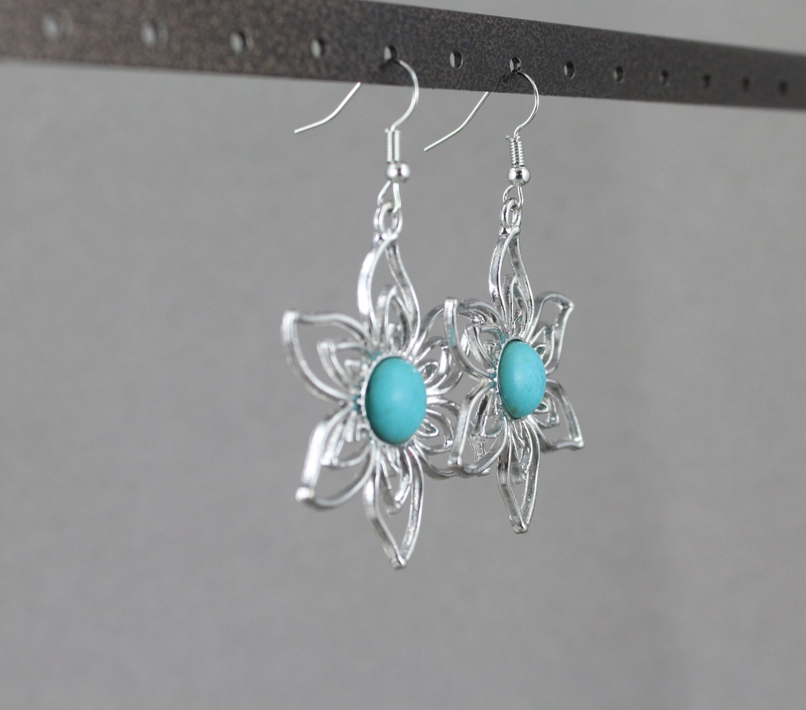 turquoise silver earrings lightweight flower outline dangle 2 3/8 long stamped
