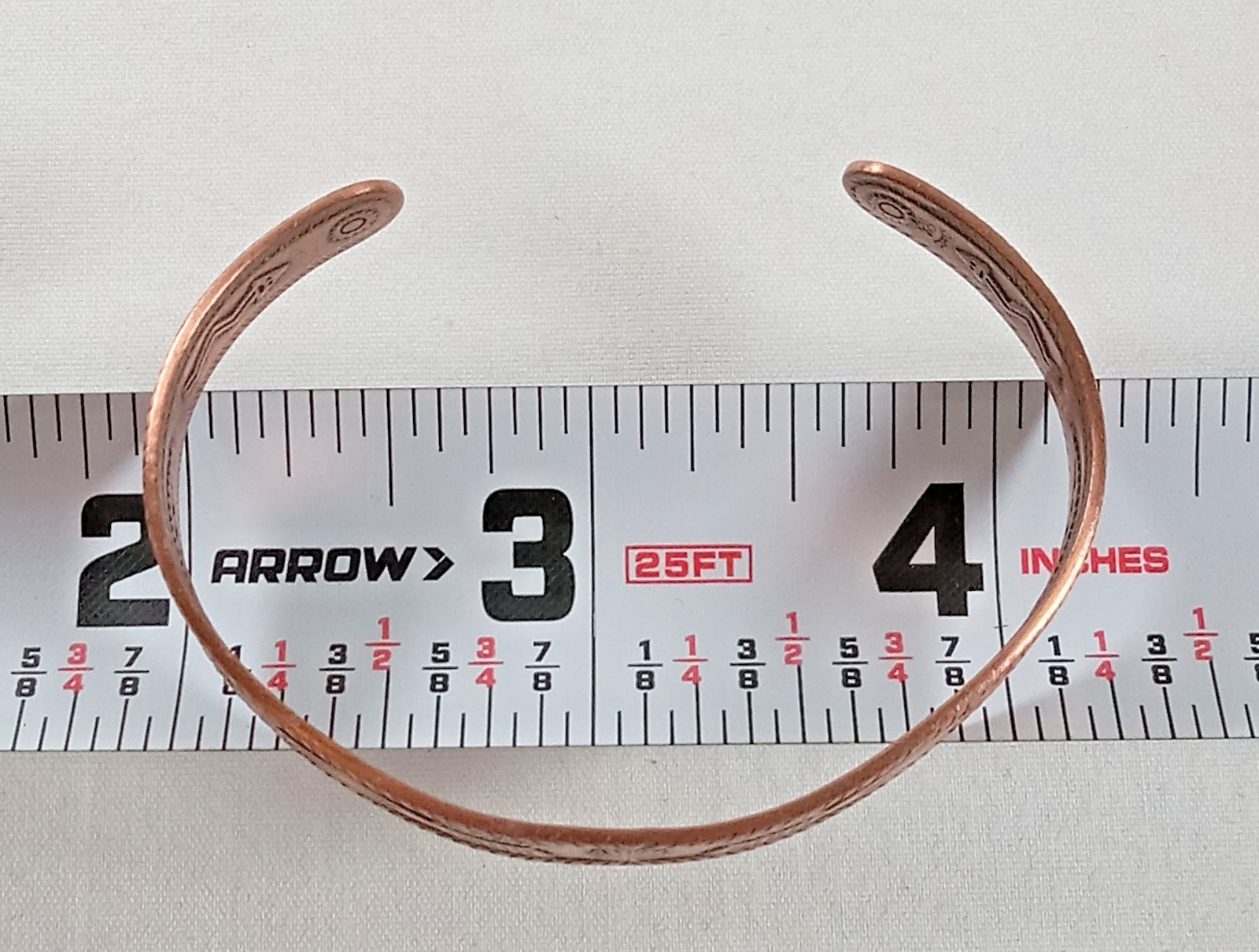 Wheeler Manufacturing Co. solid copper petite cuff embossed arrows 2 1/8″ dia