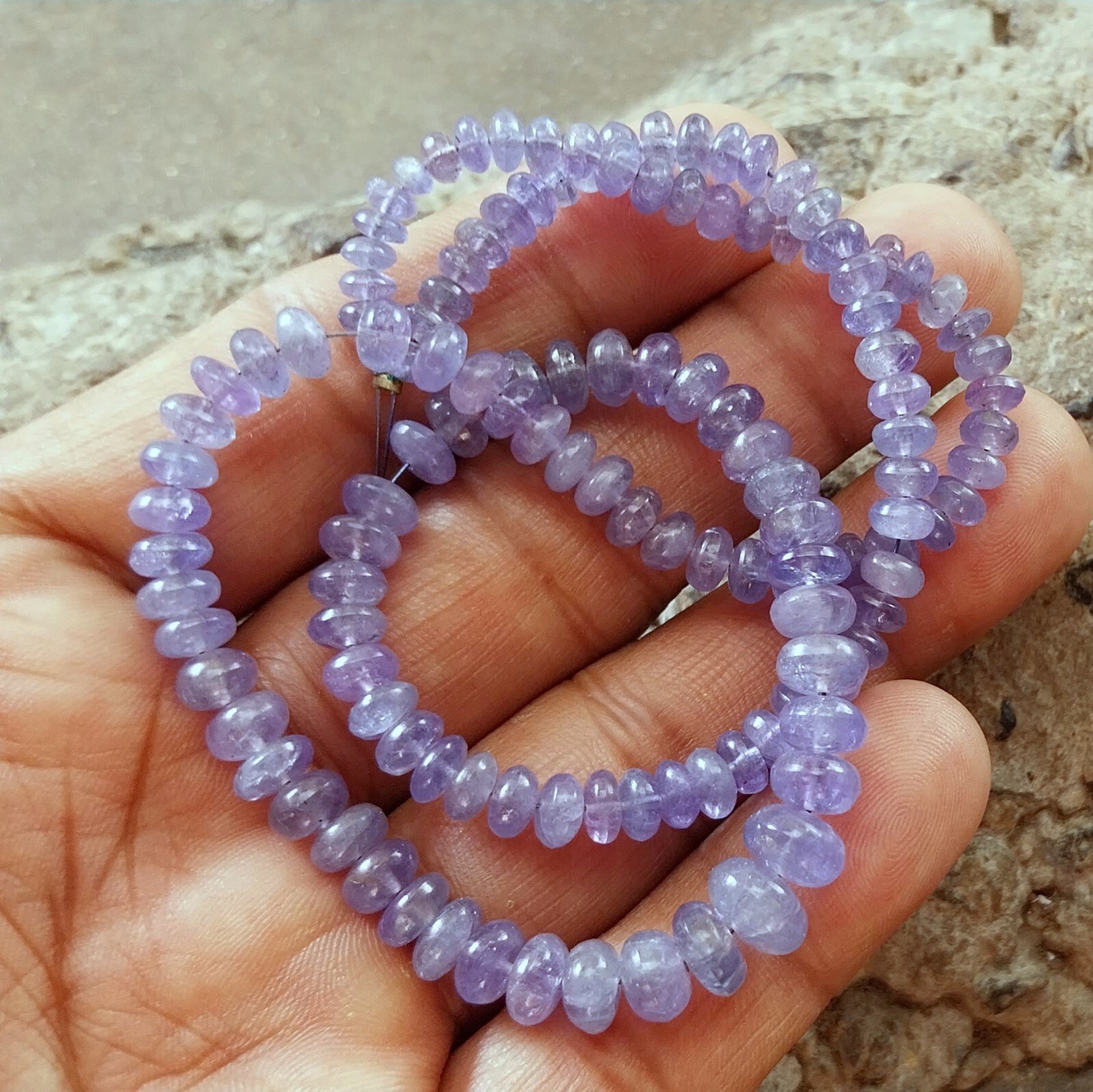 141 Carat 4.5 to 8 MM Natural Light Blue Color Smooth Tanzanite 17 Inch Beads