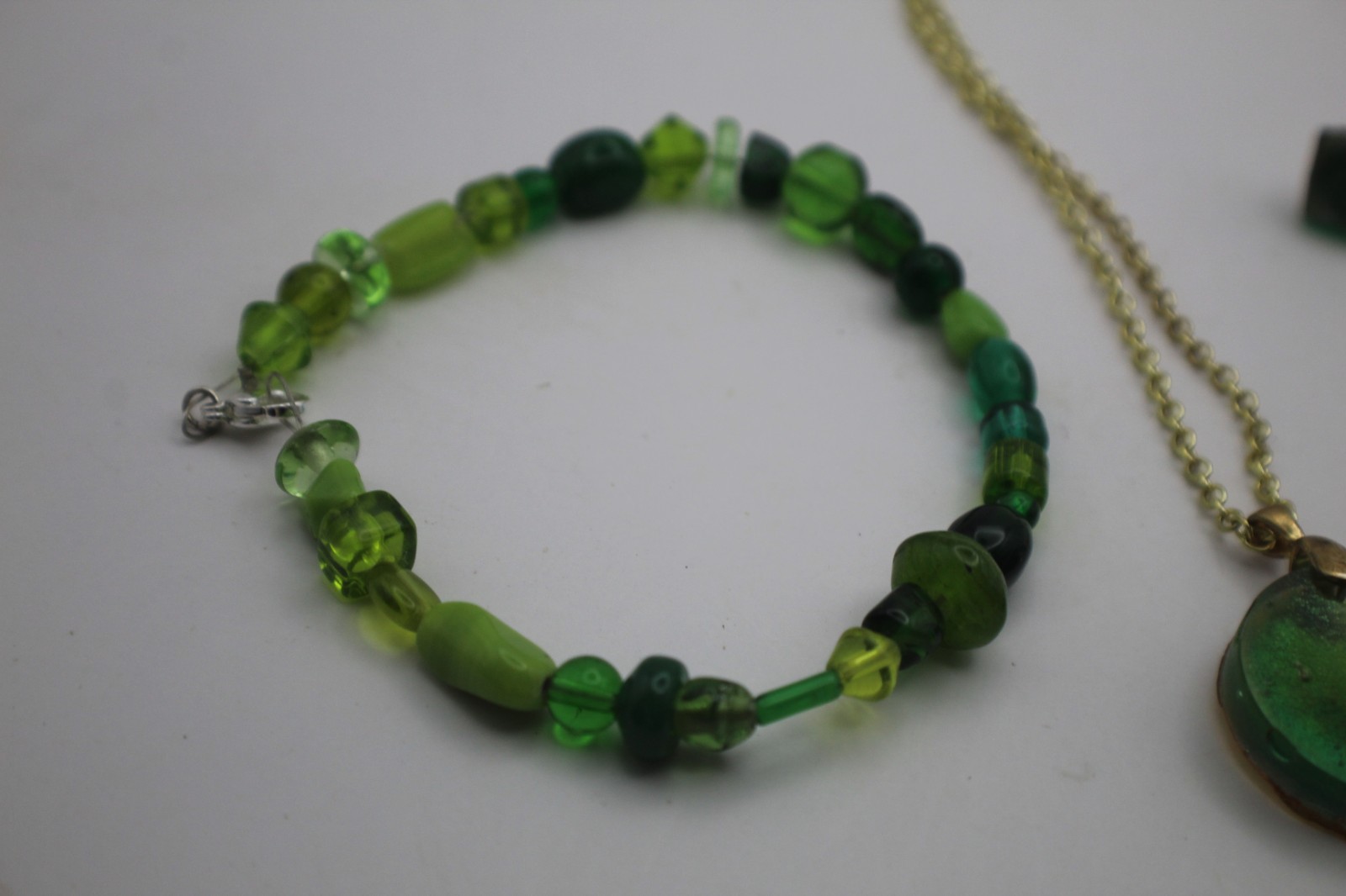 Green Three Piece Resin Jewelry Set Including Necklace Studs And Bracelet