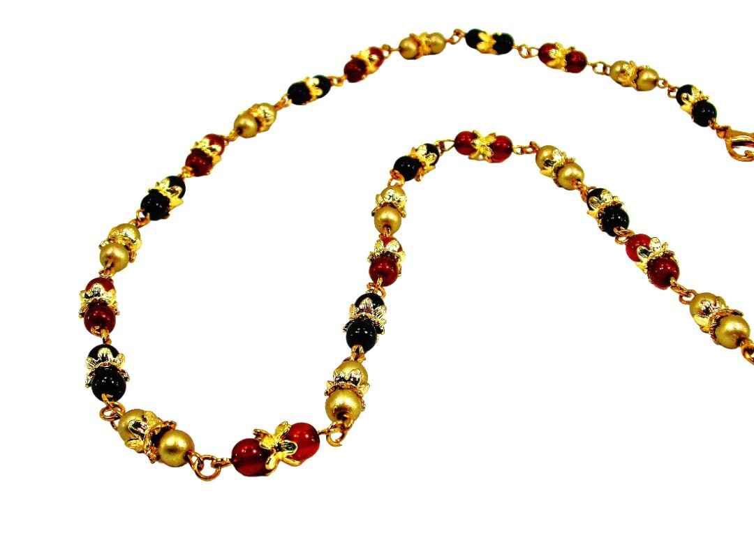 Multi color glass bead necklace with a mix of red, black, and gold colors New