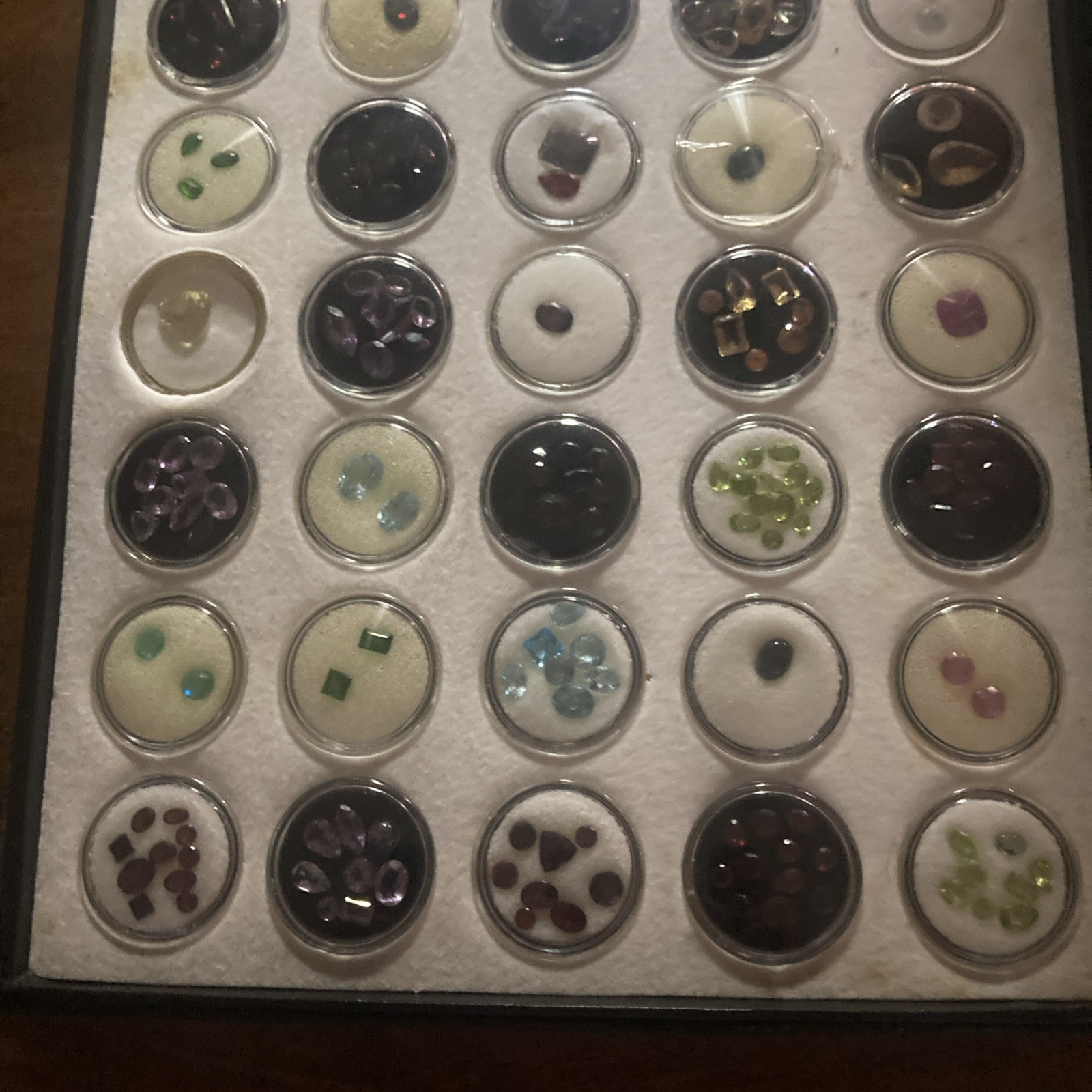 Assorted Multicolor Cut Loose Gemstones in Display Case, Gems In 100 Capsules
