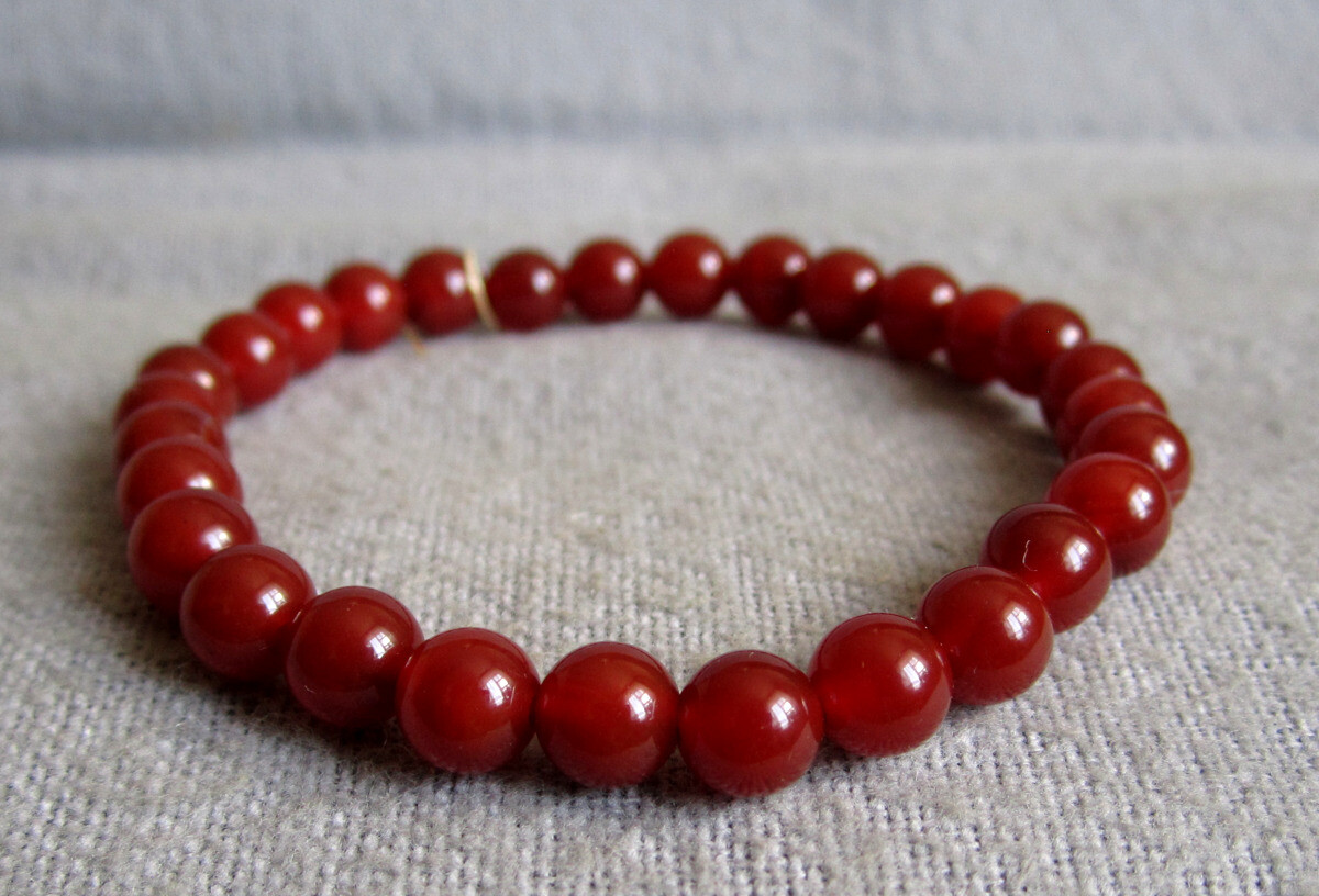 Armband aus Karneol – Kugeln Ø 6.3mm / 14-21 cm Armweite – elastisch