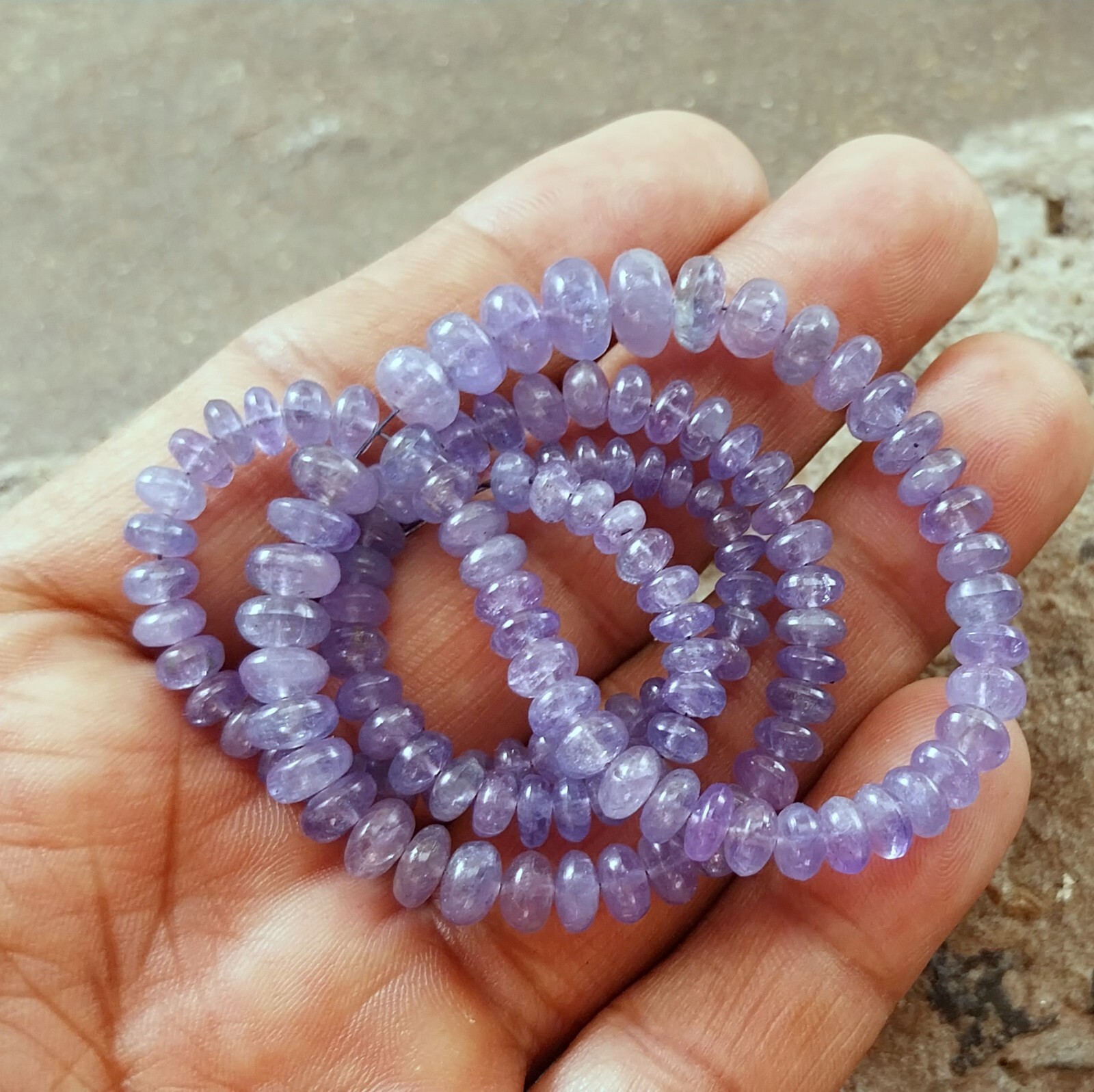 141 Carat 4.5 to 8 MM Natural Light Blue Color Smooth Tanzanite 17 Inch Beads