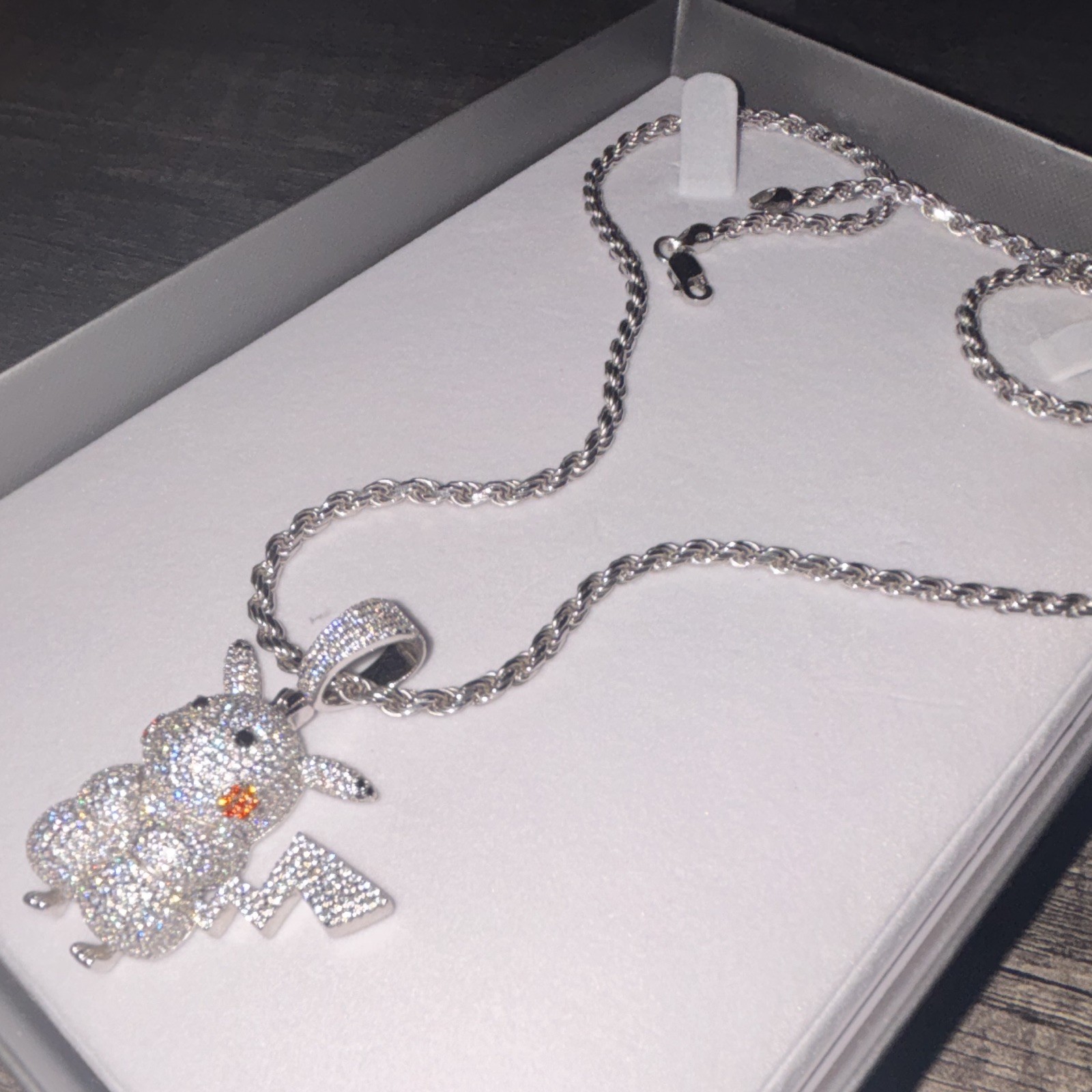 Iced out Pikachu pendant with moissanite diamonds and 92.5 silver roper chain