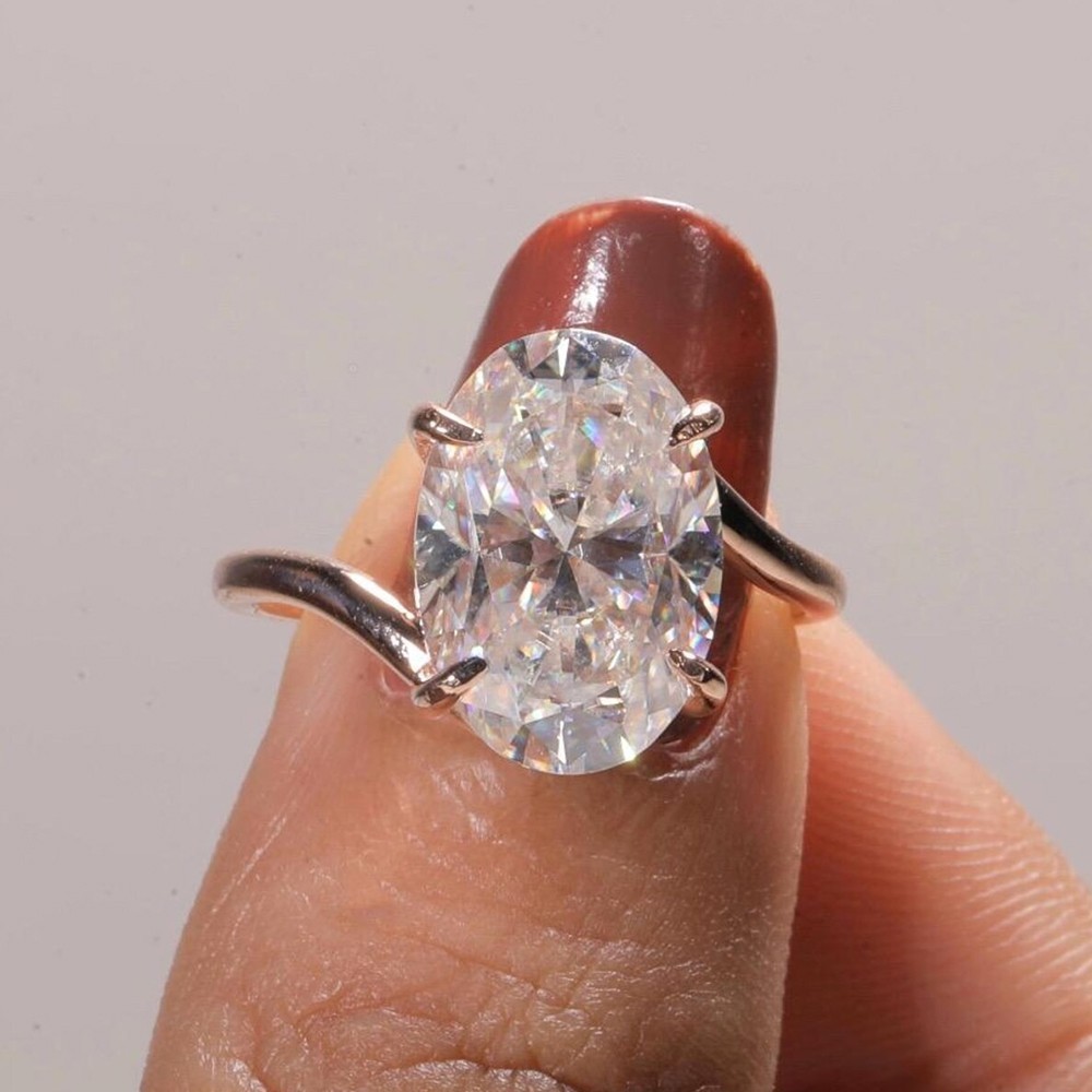 5.50 CTW Oval Cut VVS1 Moissanite Bypass Engagement Ring In 14k Rose Gold Plated