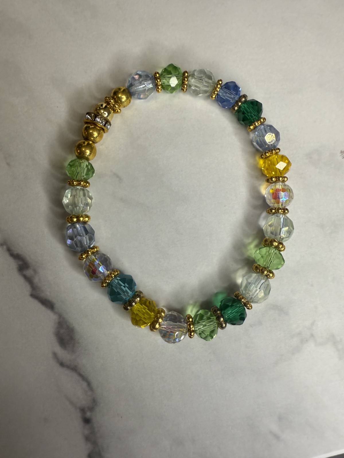 handmade beaded earrings and bracelets set green, yellow, blue and wht beads