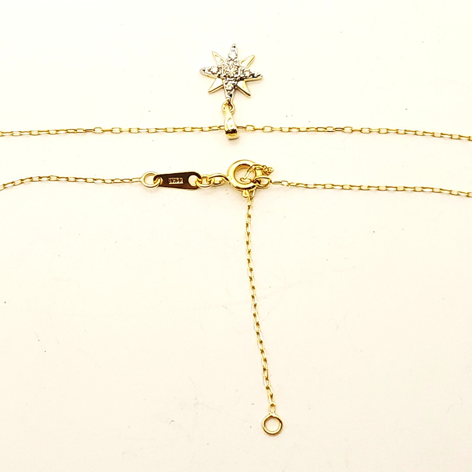 10k Gold Star Diamond Pendant on 10k Gold Chain Size: 16-18″ X 0.57mm