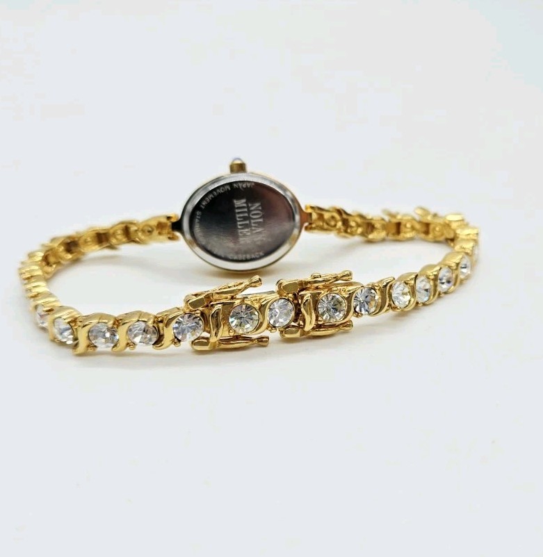 Nolan Miller Watch Tennis Bracelet Crystal Gold tone New battery Oval 7.25 in