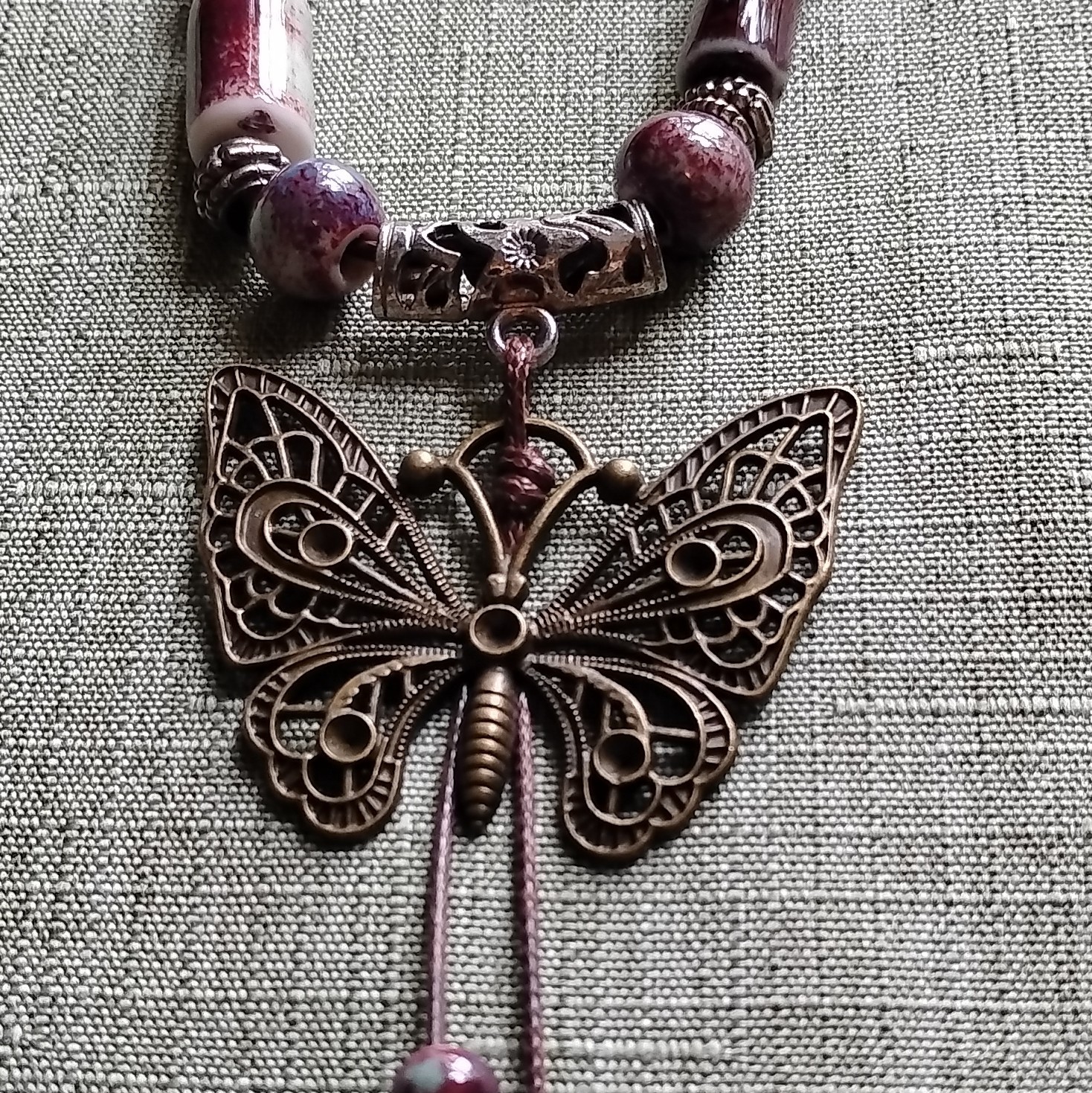 Purple Glass Beaded Cord Necklace Butterfly Charm. 3099