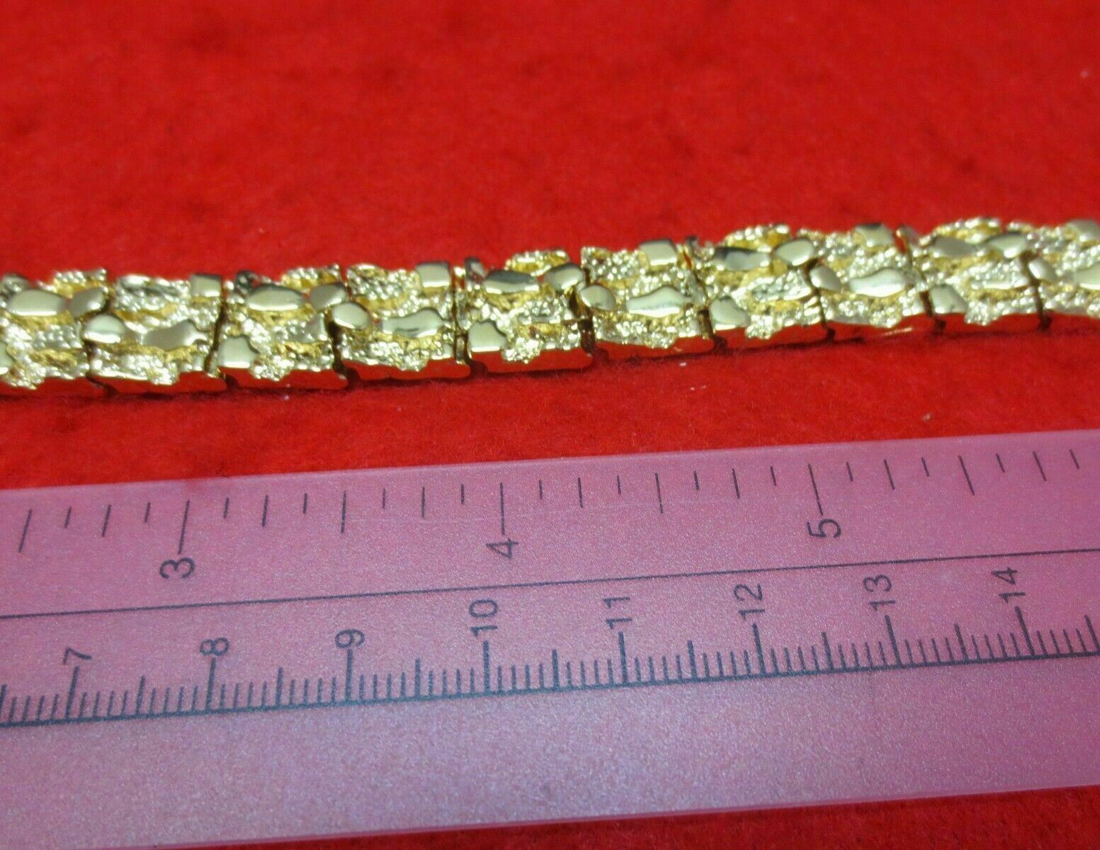14 KT GOLD HGE 8 INCH NUGGET BRACELET ABOUT 1/2 INCH WIDE WT. 43 GMS N-100