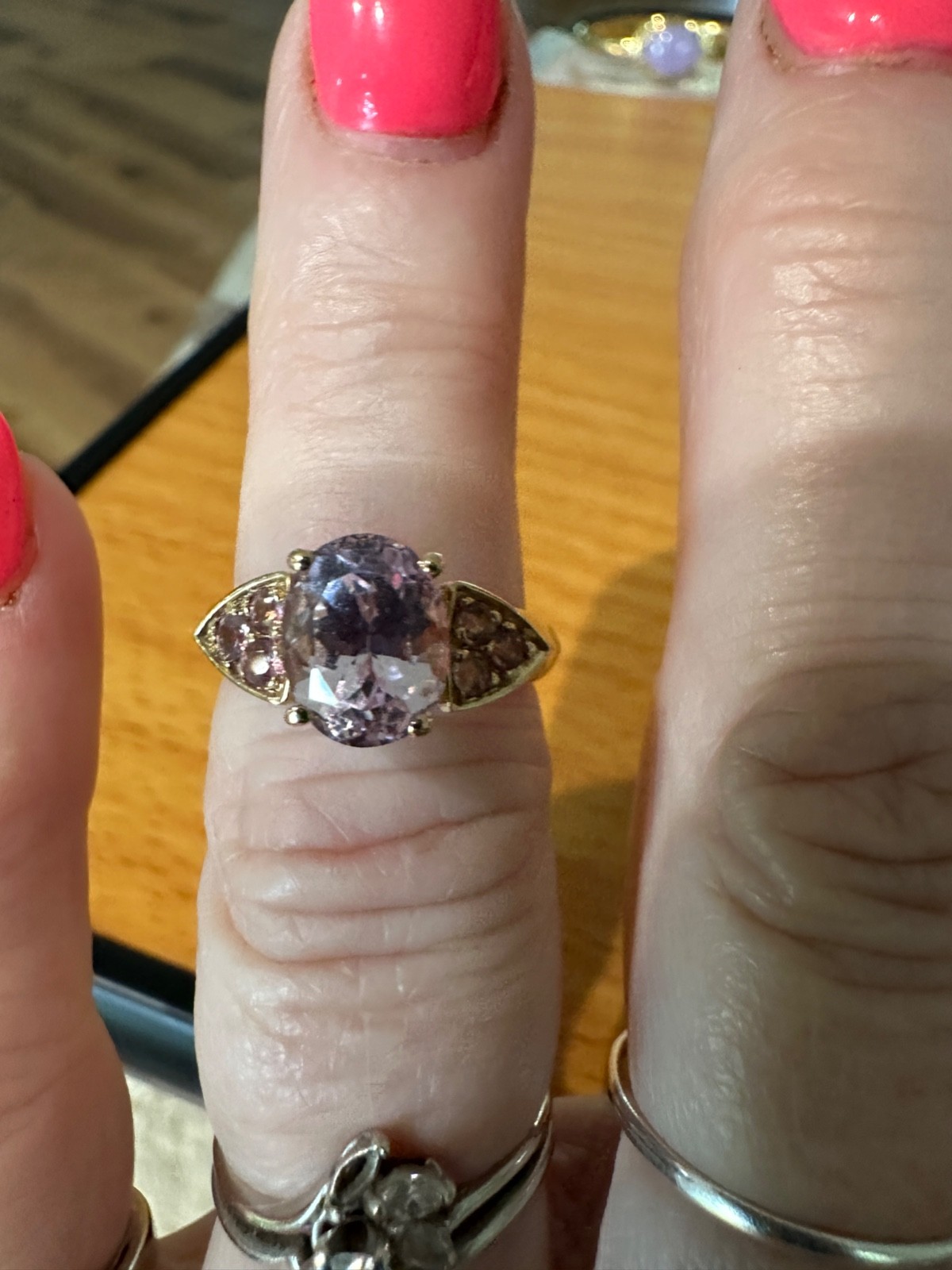 #3500. 14K yellow gold ring with Rose Quartz gems, stamped 14K, size 5.5