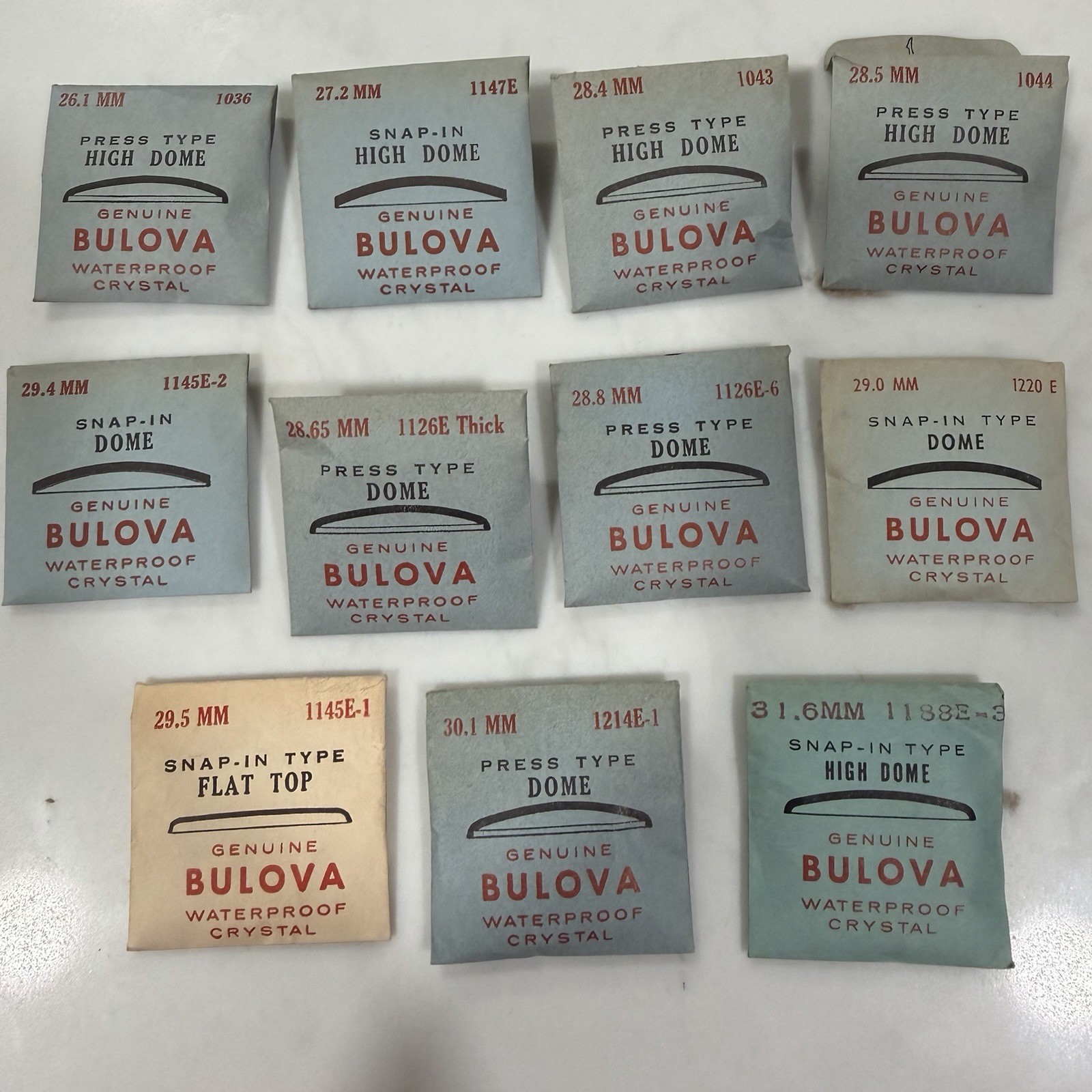 Lot Of 11 Genuine BULOVA Dome Type Watch Crystals 26.1-31.6mm NEW OLD STOCK!