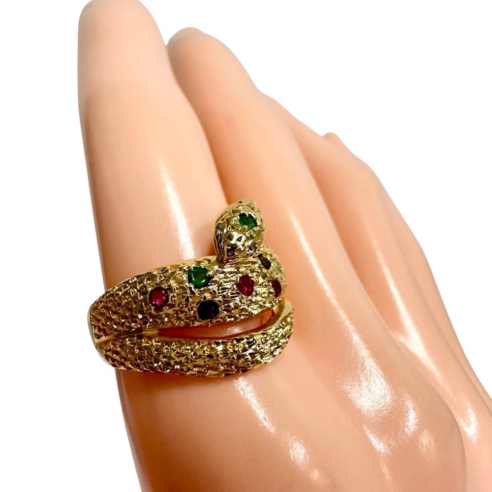 US 6.4 Snake motif Ruby Total 0.16ct sapphire Total 0.09ct Emerald Total of …