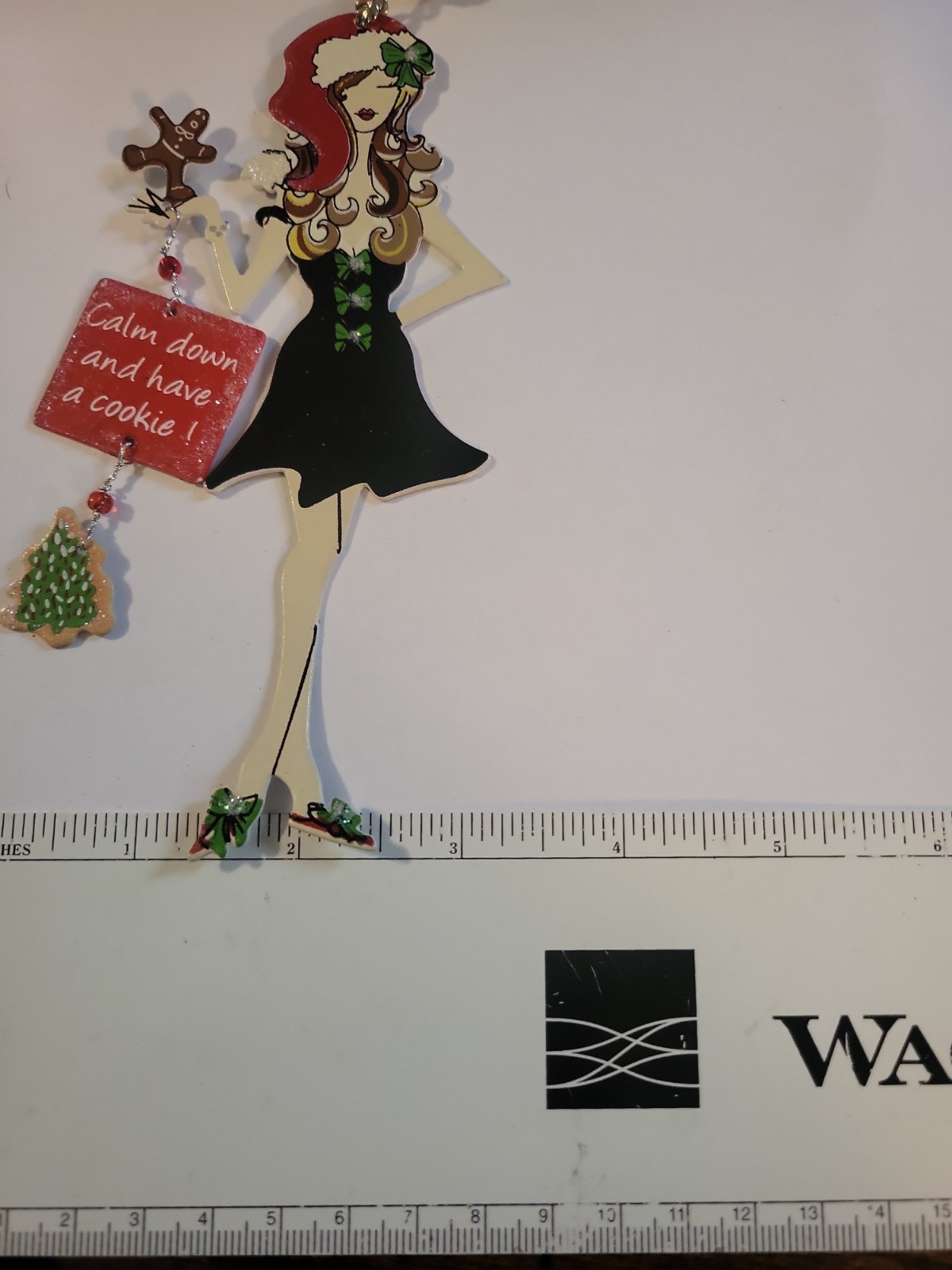 Christmas Pendant White Woman Dressed In Holiday Outfit With A Sign
