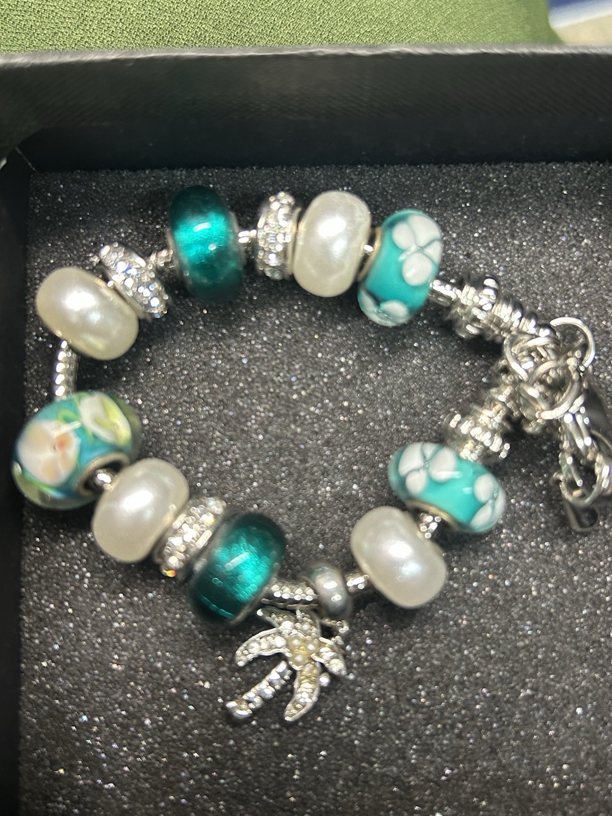 Bella Perlina Green/Silver Charm Bracelet With Palm Tree Rhinestone Accent