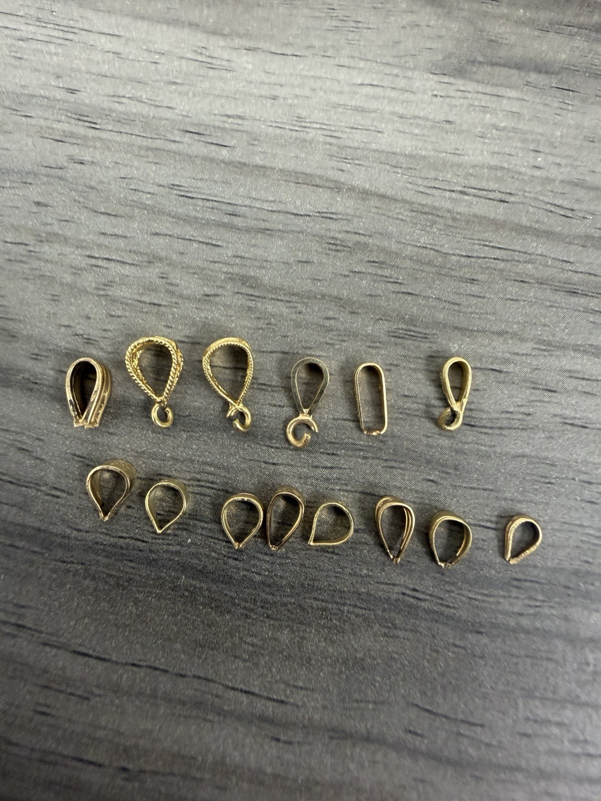 14 Miscellaneous Pre Owned 14k Yellow Gold Bails In Various Sizes