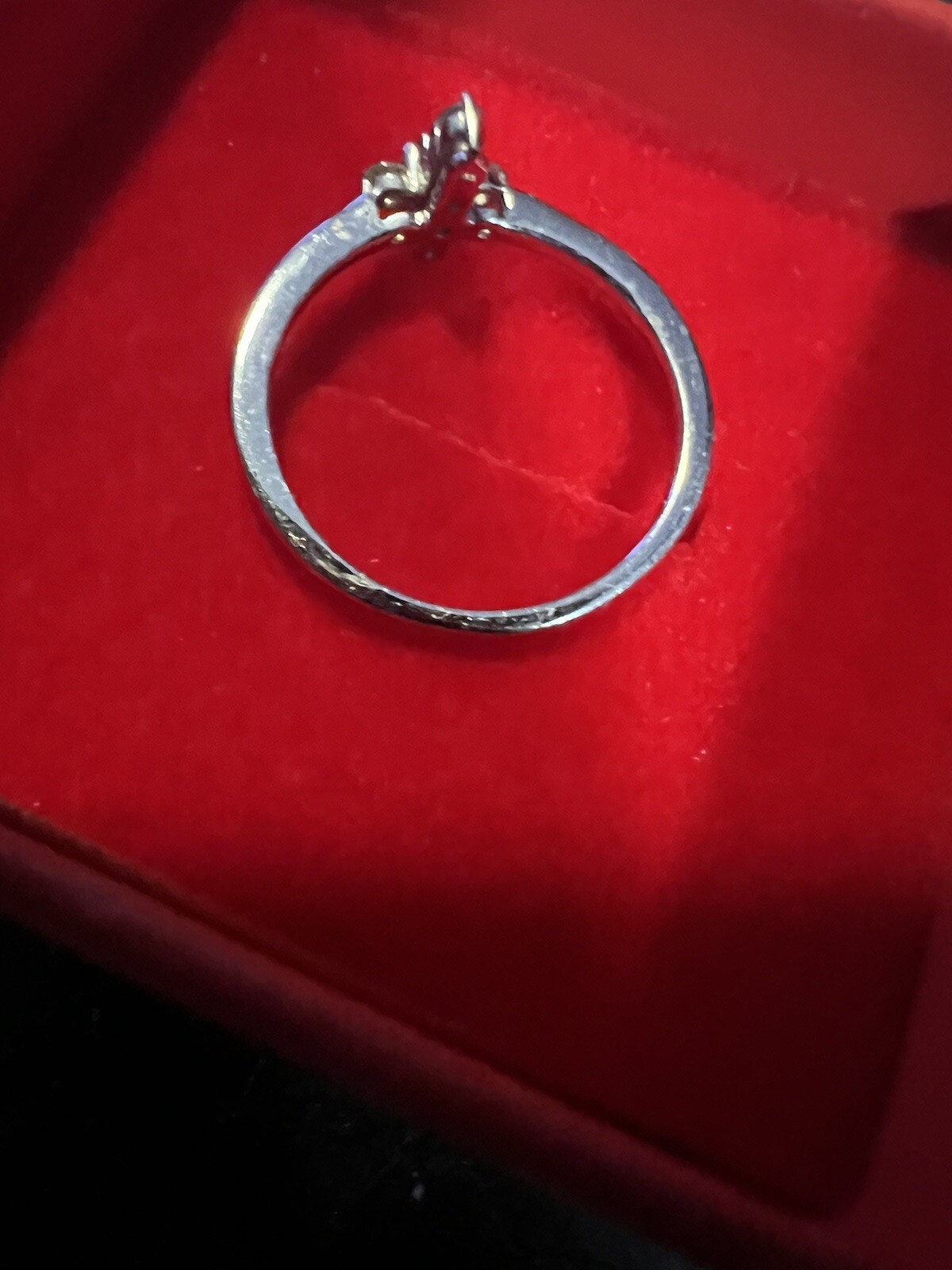 .06 ctw Round Cut Diamond Prong Set Cross Ring 14k White Gold Size 5.5approx.
